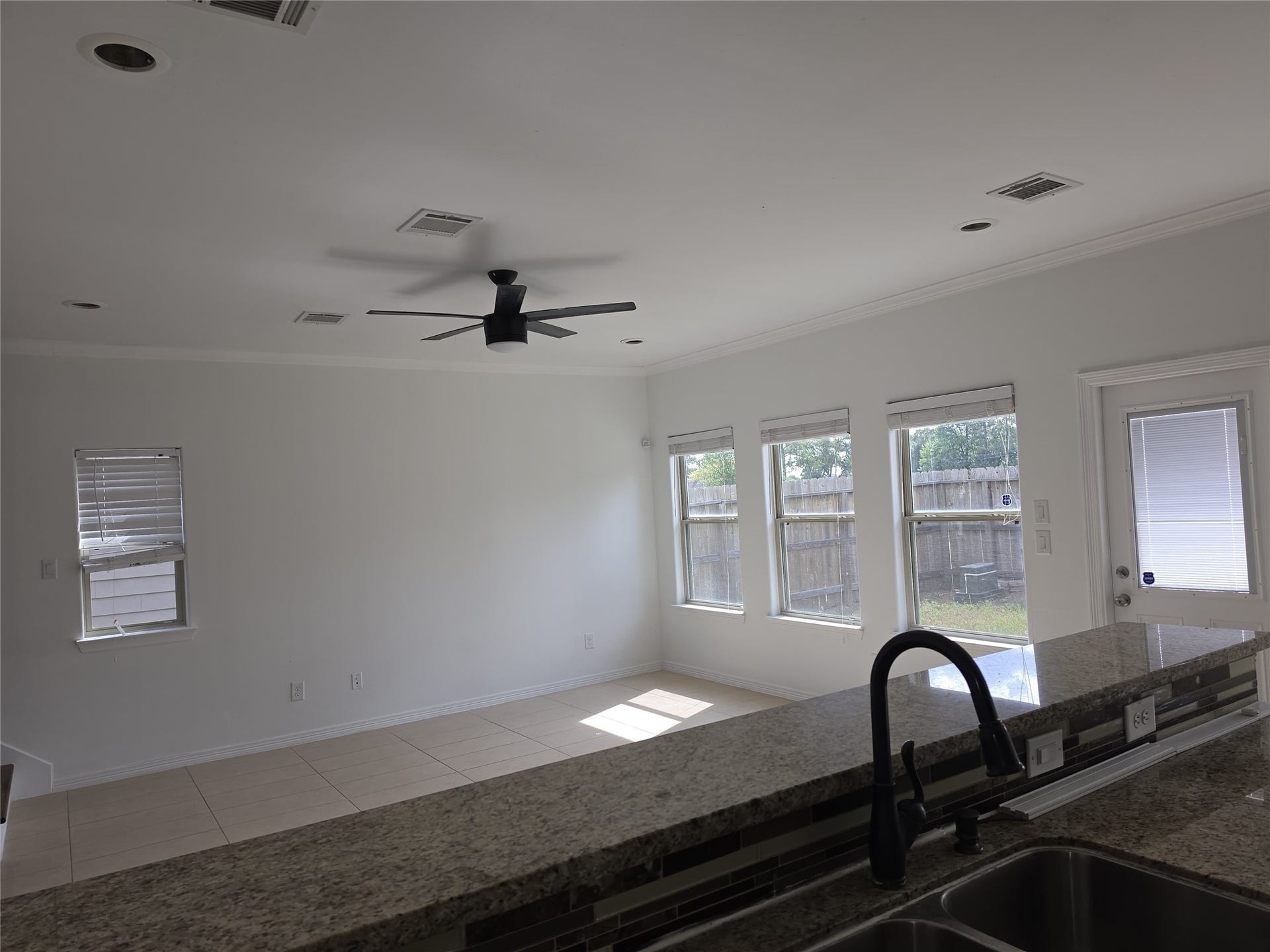 7202 Foxmoor Lake Court, Humble, TX 77338 From the kitchen, look into the open living area.
