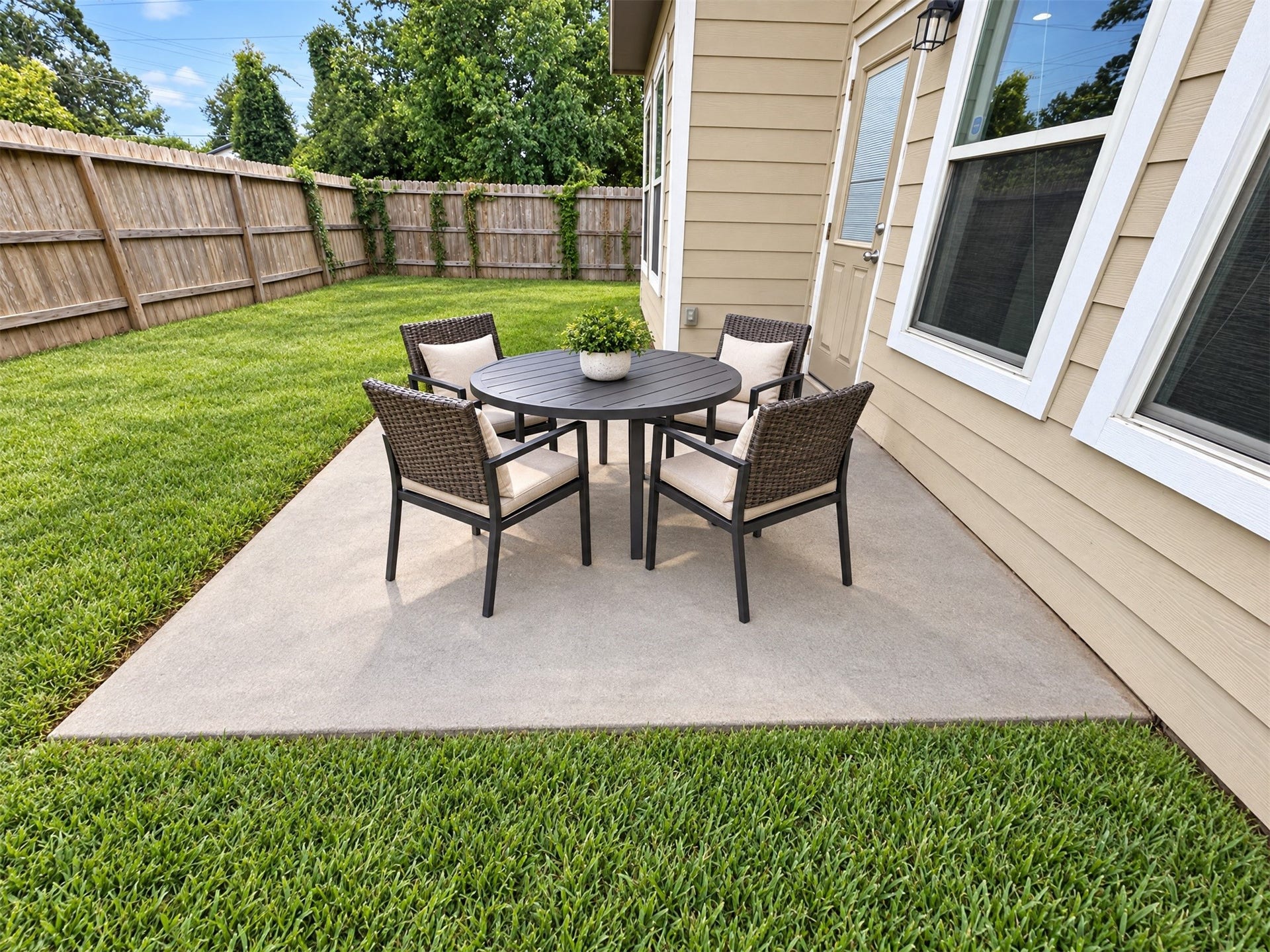7202 Foxmoor Lake Court, Humble, TX 77338 Staged patio setup for outdoor entertaining.