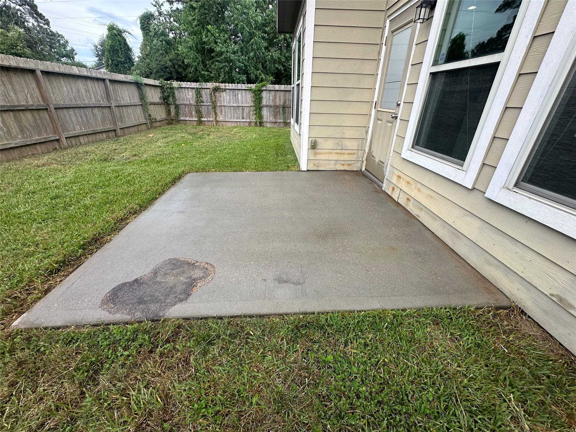 7202 Foxmoor Lake Court, Humble, TX 77338 Backyard patio and lawn with room to relax or entertain.