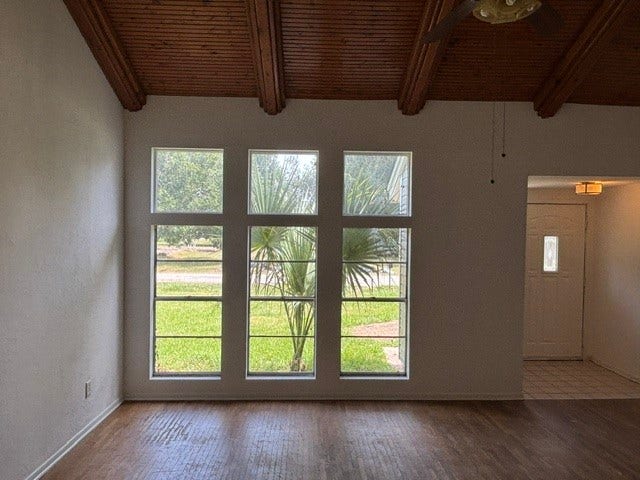 4730 Charles Street, Pasadena, TX 77586 A view of the living room looking out towards the front door and the front yard. Again, notice the solid hardwood floors and look at the gorgeous hard wood ceiling.