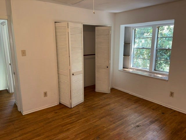 4730 Charles Street, Pasadena, TX 77586 one of the secondary bedrooms upstairs. Notice the hardwood floors continue upstairs.
