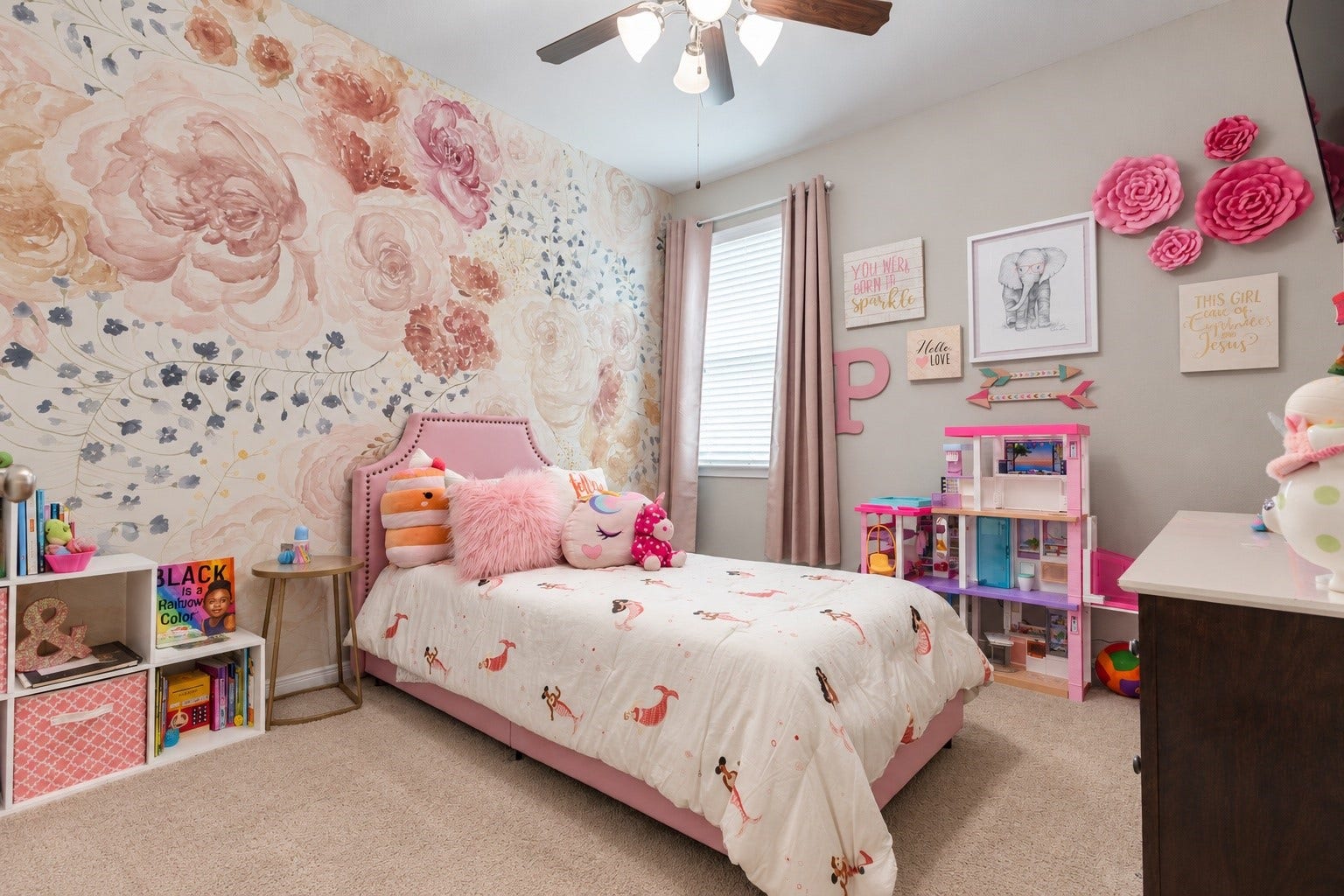 Secondary bedroom featuring a ceiling fan, natural light, and plenty of space for a comfortable bedroom setup.