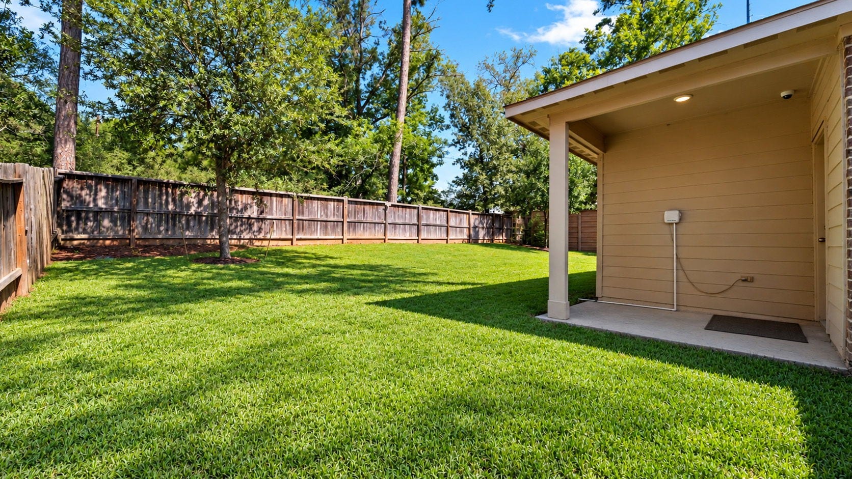 11502 Castle Nugent Court, Conroe, TX 77304 Your own backyard retreat! Enjoy relaxing or entertaining on the covered patio overlooking the spacious, fully fenced backyard.