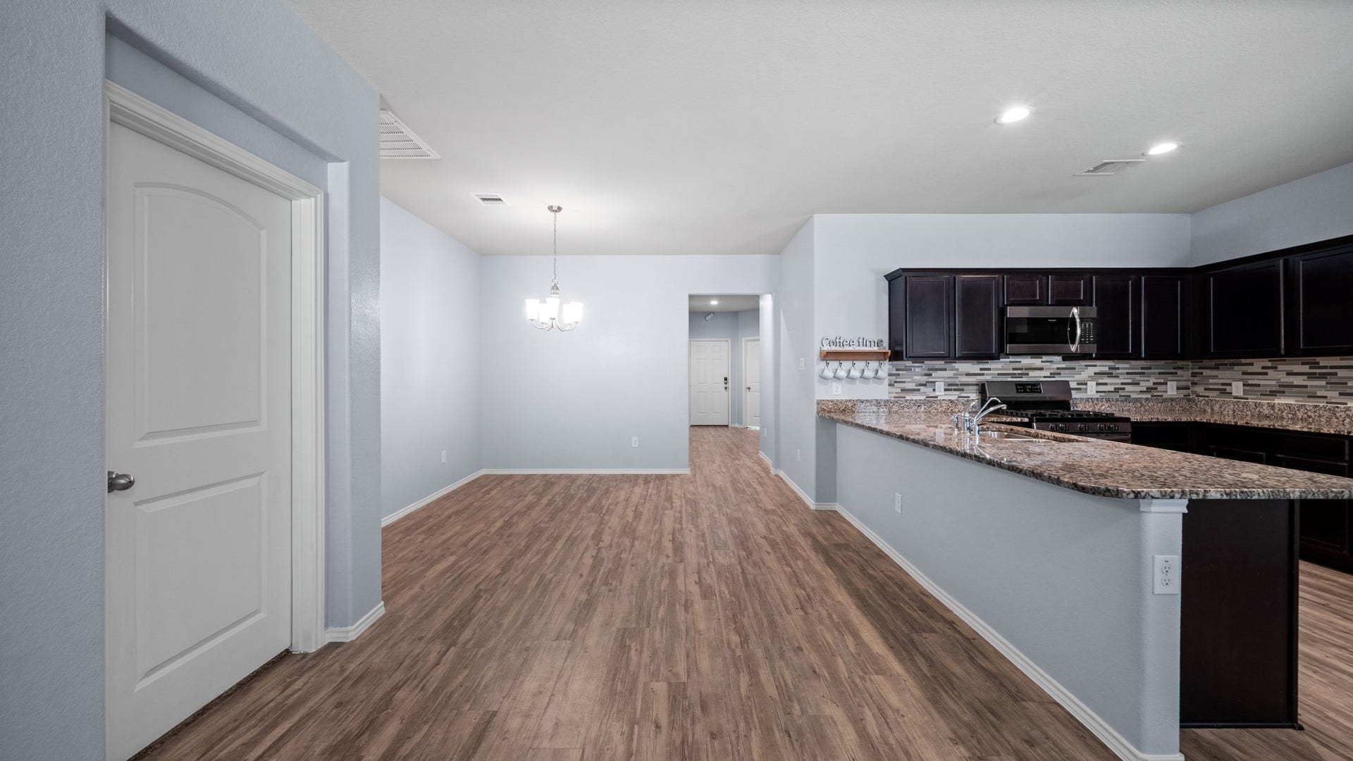 11502 Castle Nugent Court, Conroe, TX 77304 Thoughtfully designed floor plan provides easy access from the entry hallway to the open kitchen and dining areas.