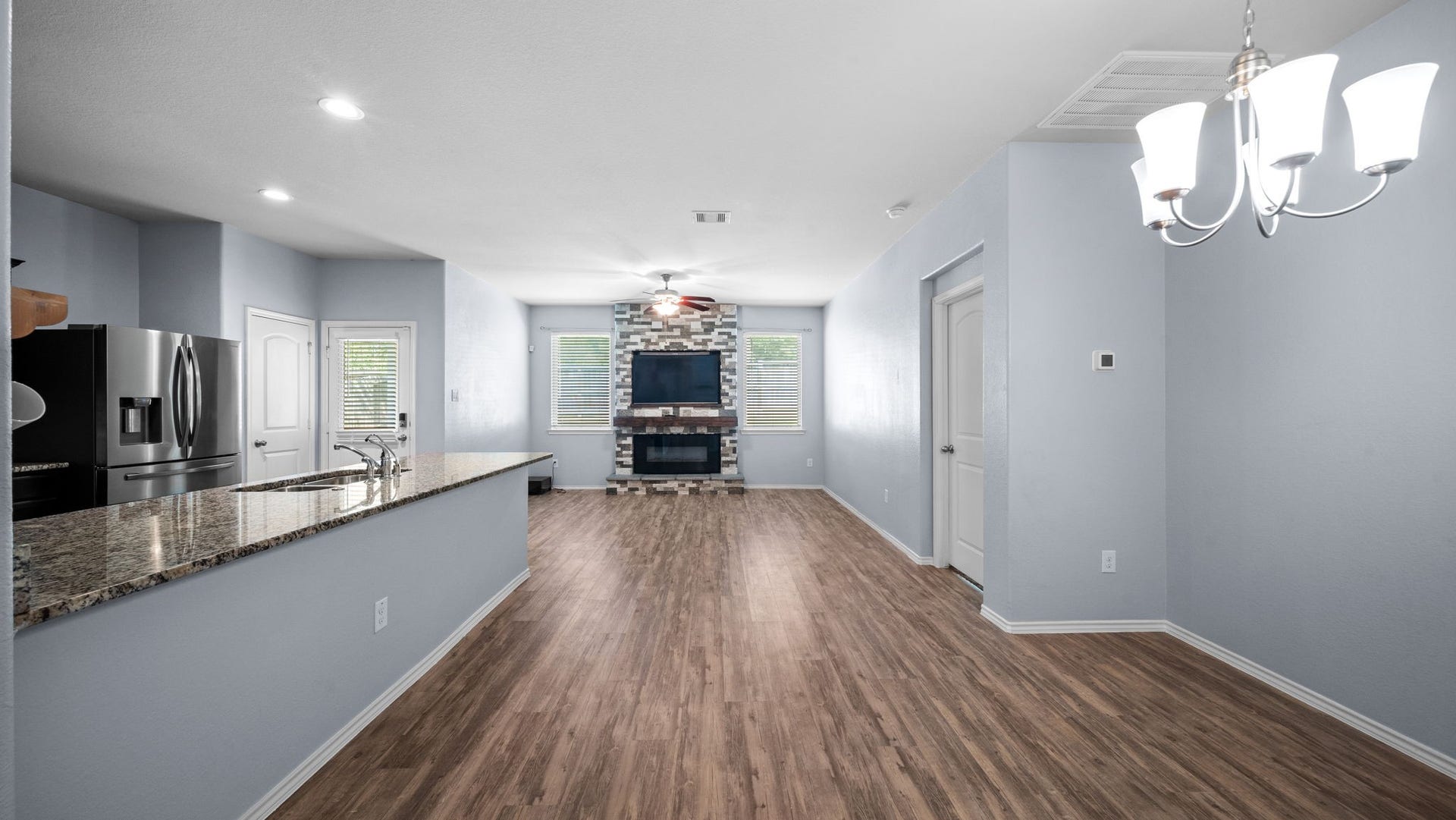 11502 Castle Nugent Court, Conroe, TX 77304 Enjoy an open dining space that connects effortlessly to the kitchen and living room, ideal for meals and gatherings.