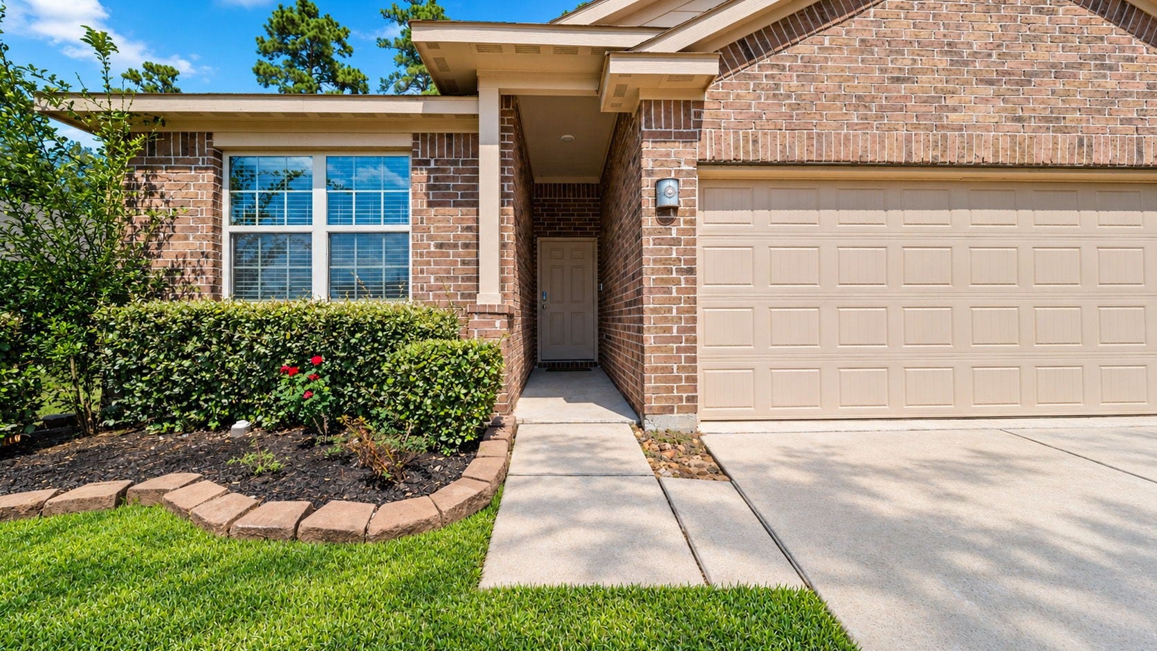11502 Castle Nugent Court, Conroe, TX 77304 Charming brick exterior, attractive landscaping, and a welcoming covered entry make a wonderful first impression.