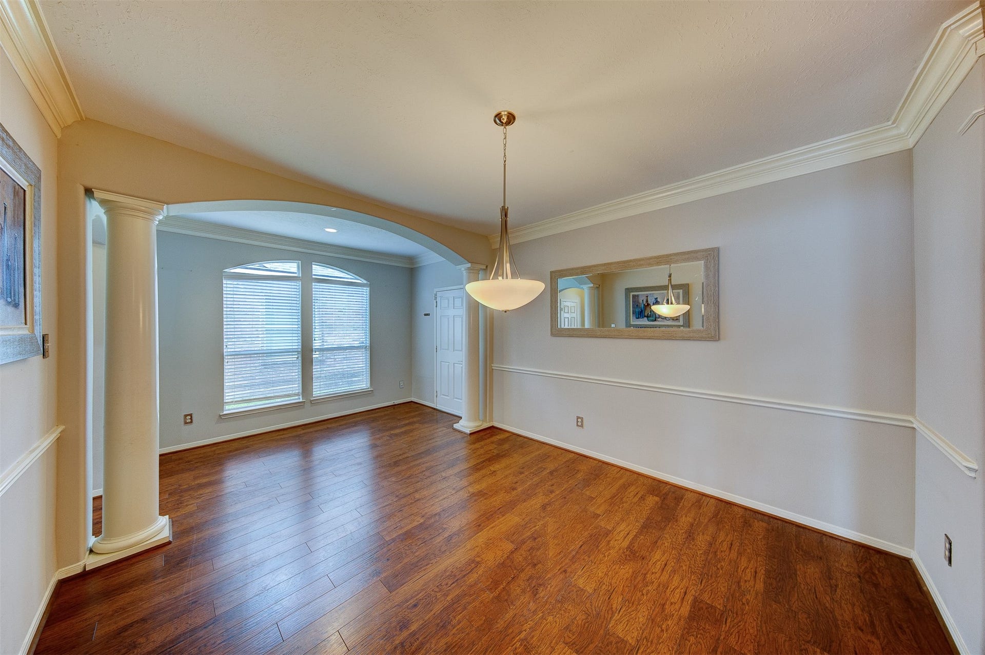 2619 Emerald Springs Court, Pearland, TX 77584 Warm and inviting front formal dining area