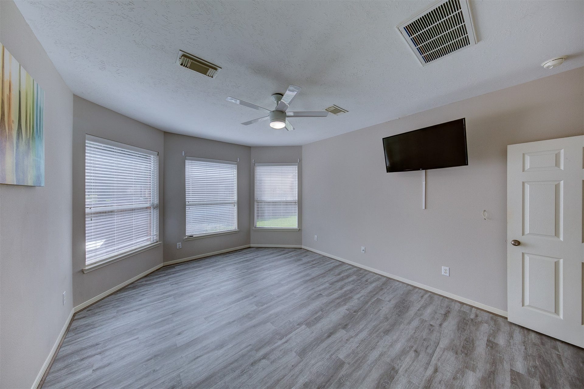 2619 Emerald Springs Court, Pearland, TX 77584 Large inviting primary bedroom with new flooring