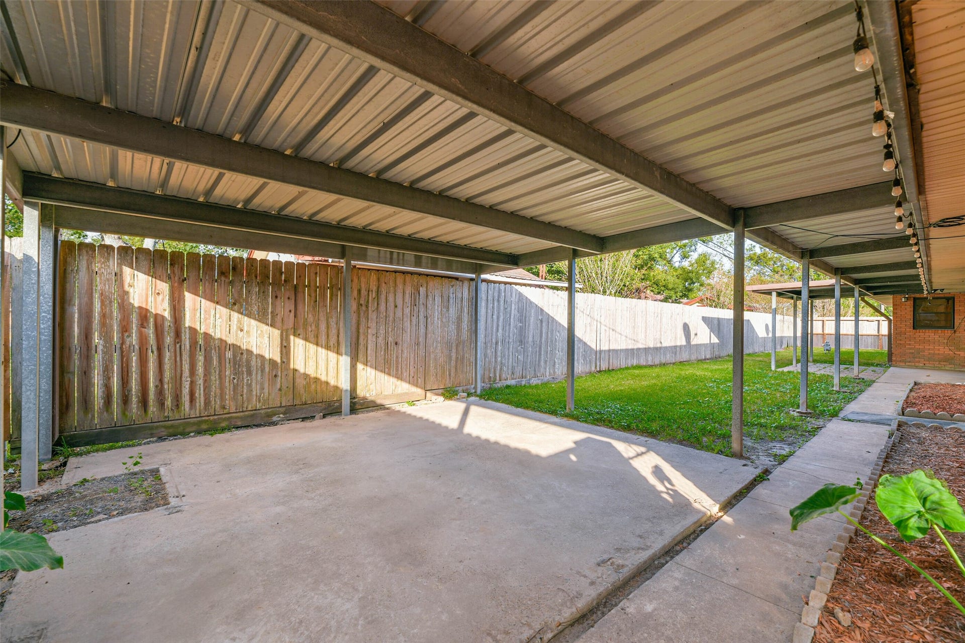 8102 Dellanera Drive, Hitchcock, TX 77563 More Coverage Outdoor living!