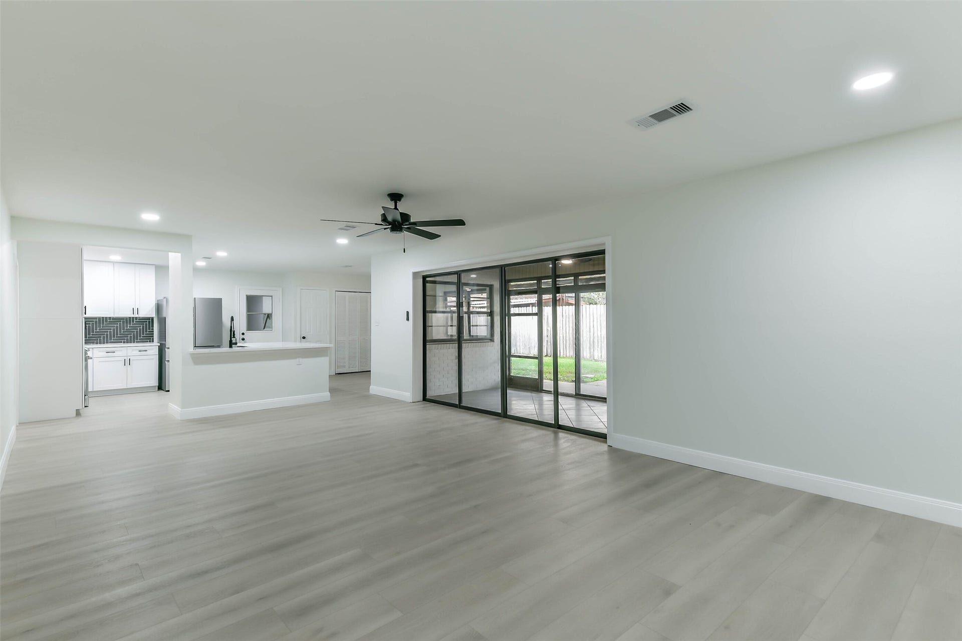 8102 Dellanera Drive, Hitchcock, TX 77563 Open Concept Living Room/Kitchen/Breakfast Area