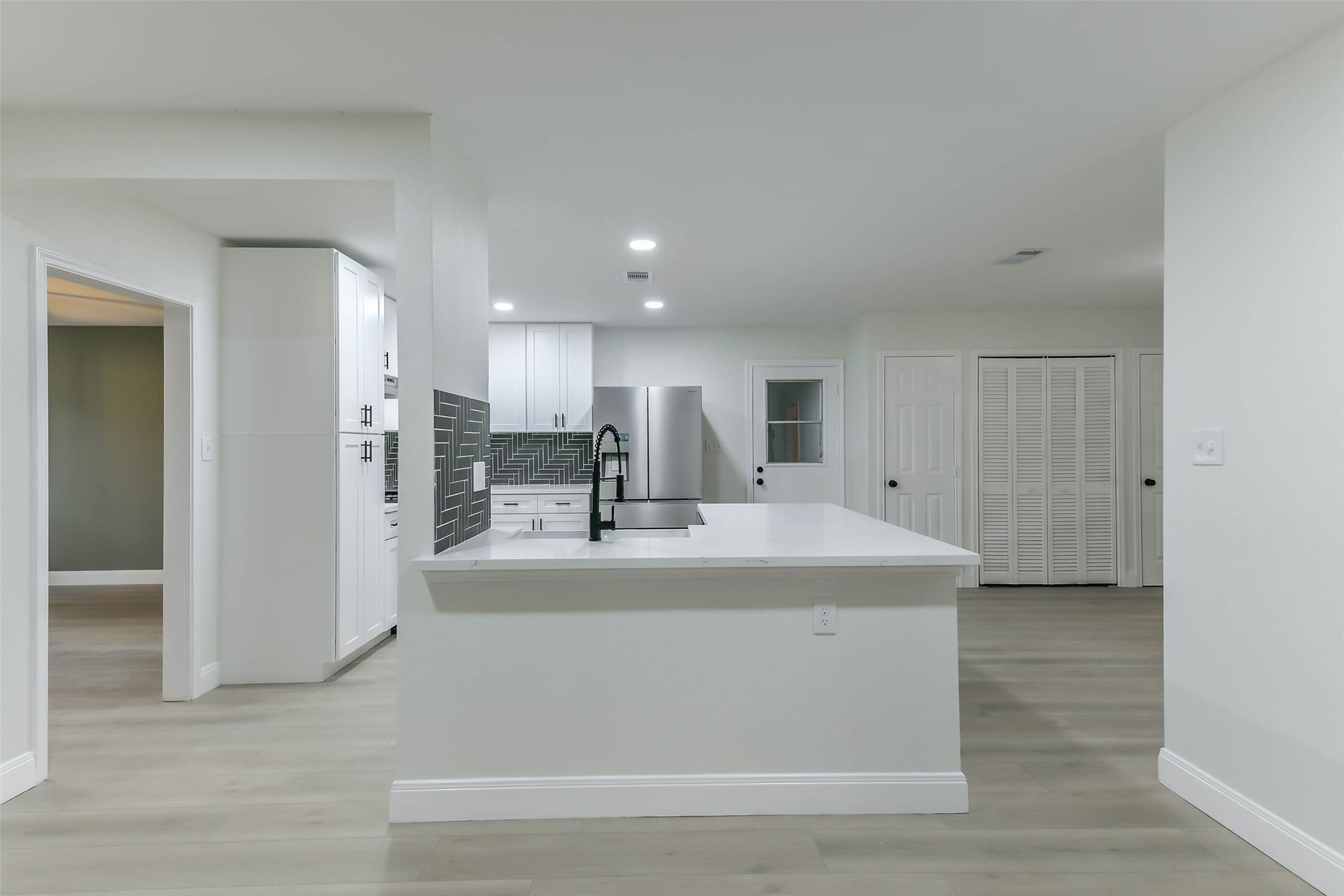 8102 Dellanera Drive, Hitchcock, TX 77563 Kitchen with island with sink and dishwasher all the appliances are BRAND NEW!