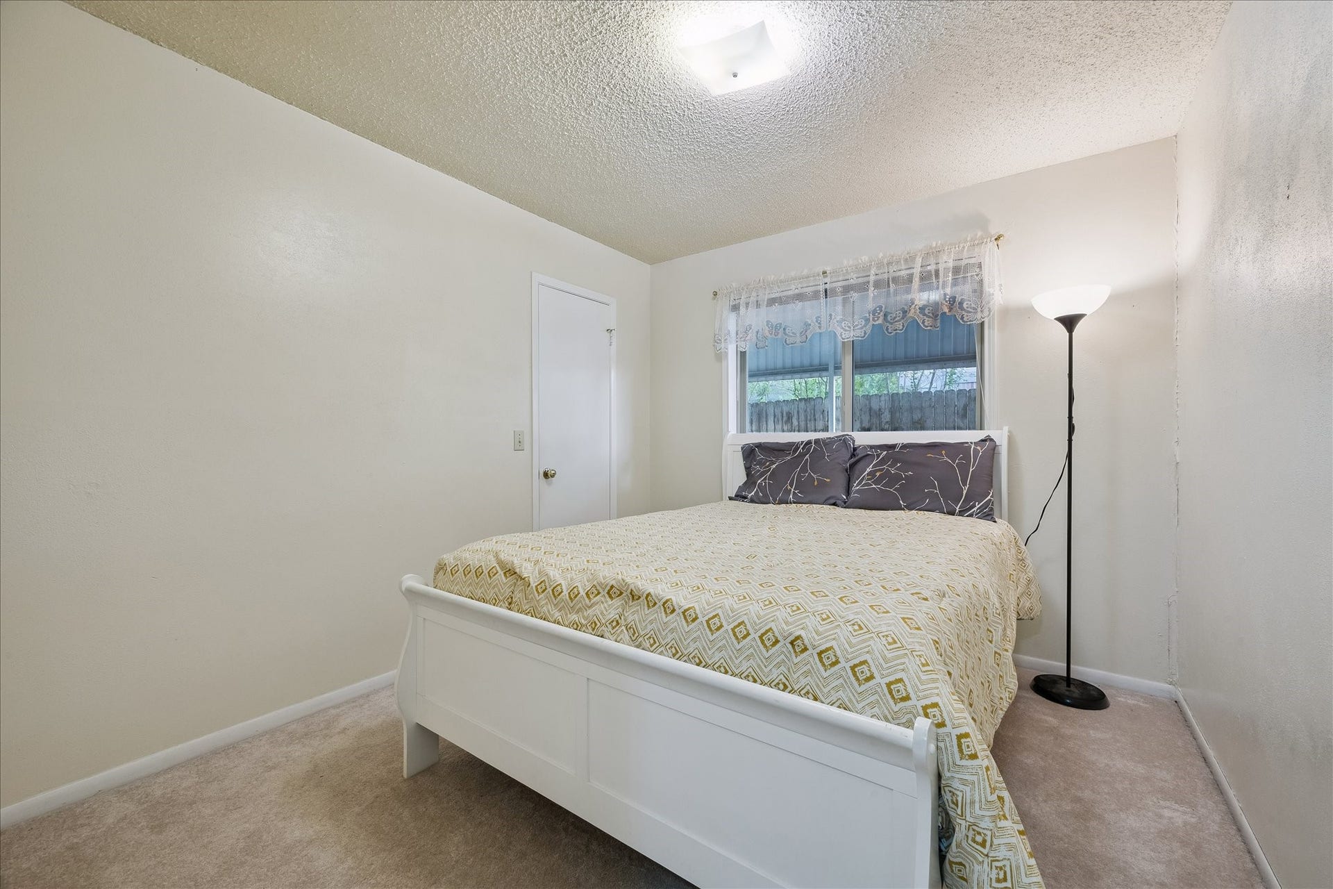 One of two secondary bedrooms. Nice closet space with built-in shelving and drawers.