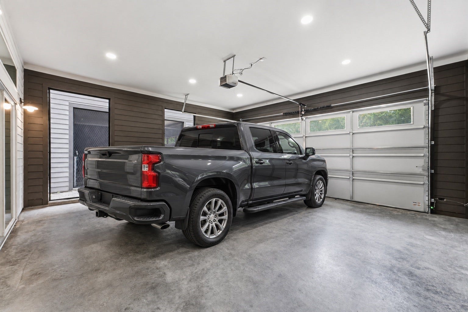 Large Garage with 8 Foot Garage Door. Fits the Texas Sized Trucks
