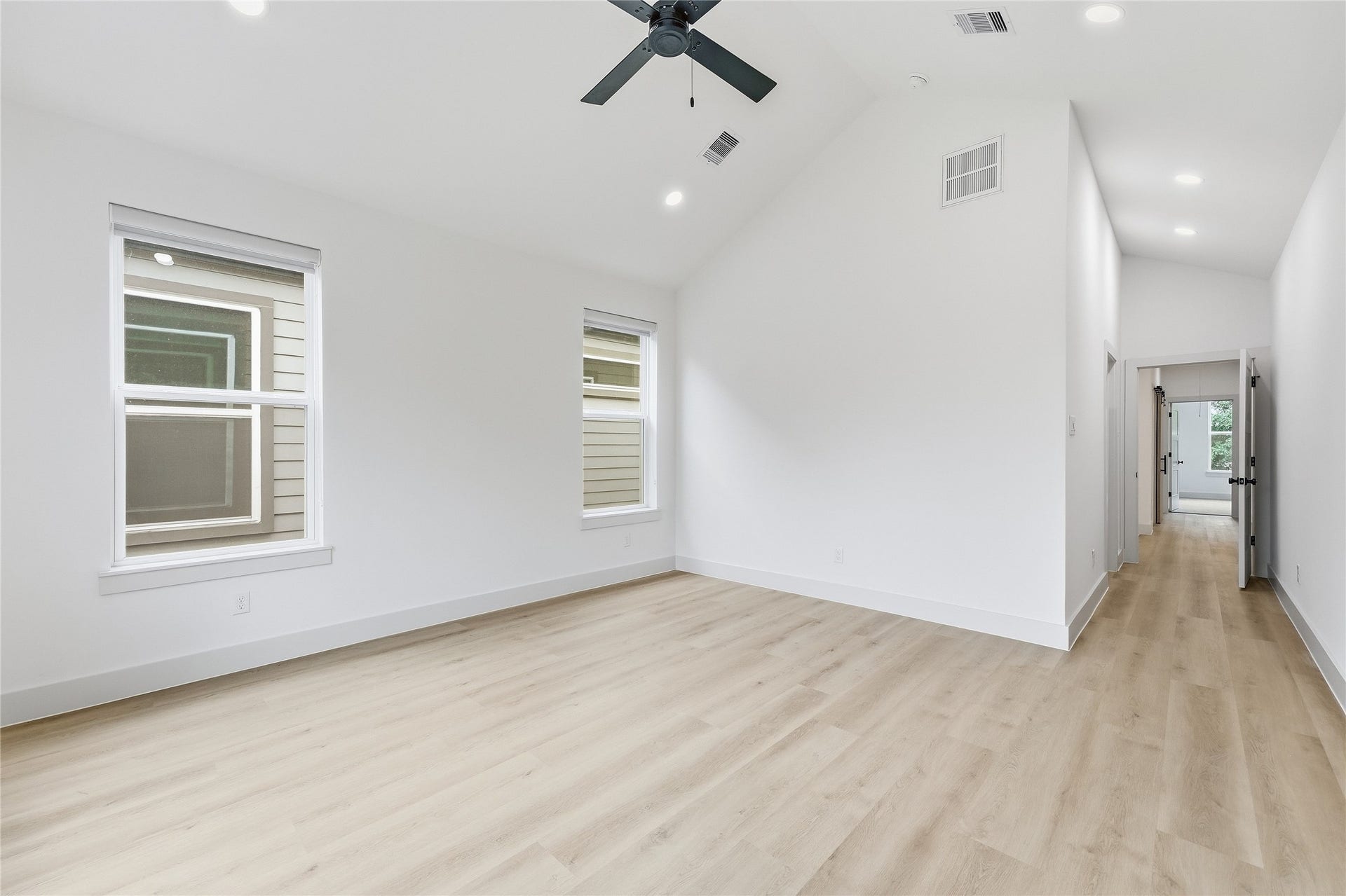 Primary Bedroom with Vaulted Ceiling