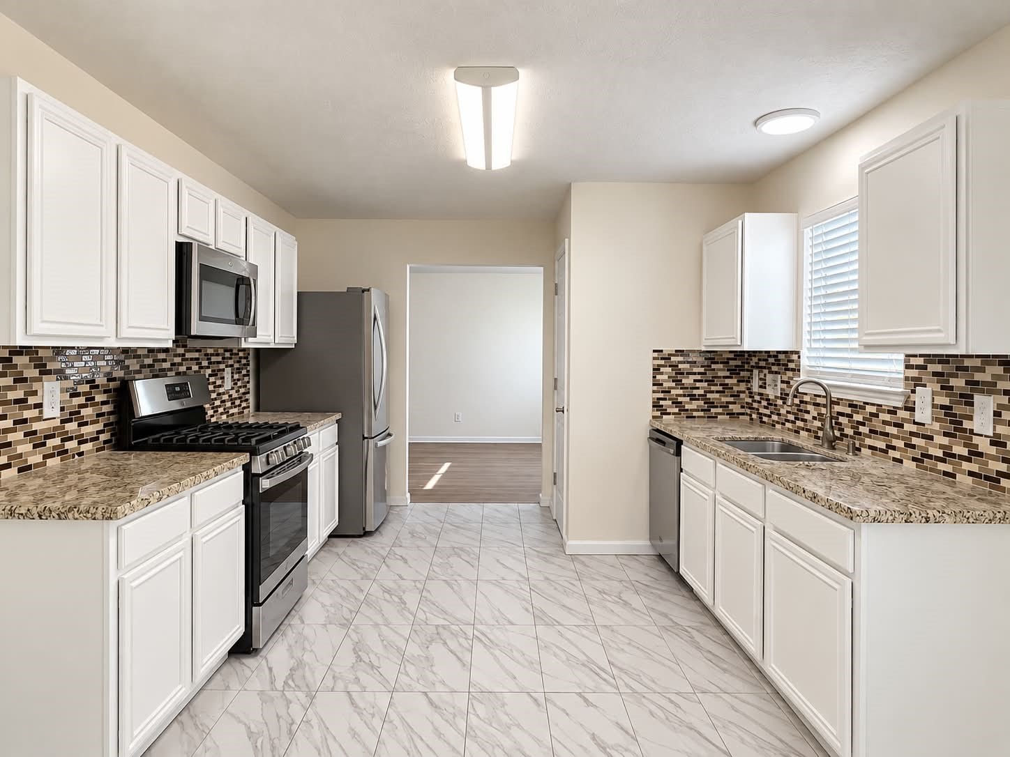 18131 Eganville Circle, Tomball, TX 77377 New stove/oven range, dishwasher and microwave with refreshed cabintry
