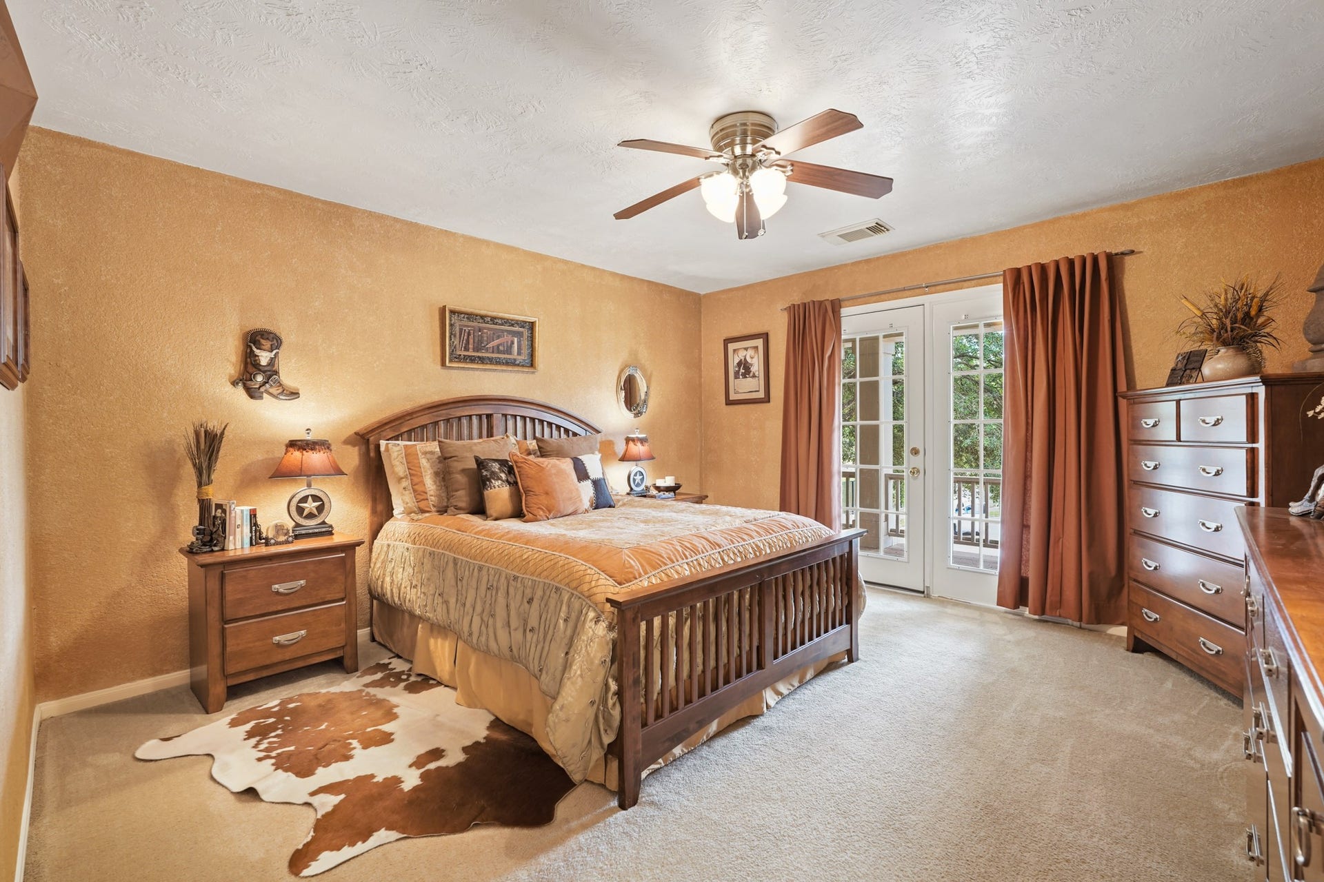 Secondary bedroom with a fantastic view from the outdoor balcony.