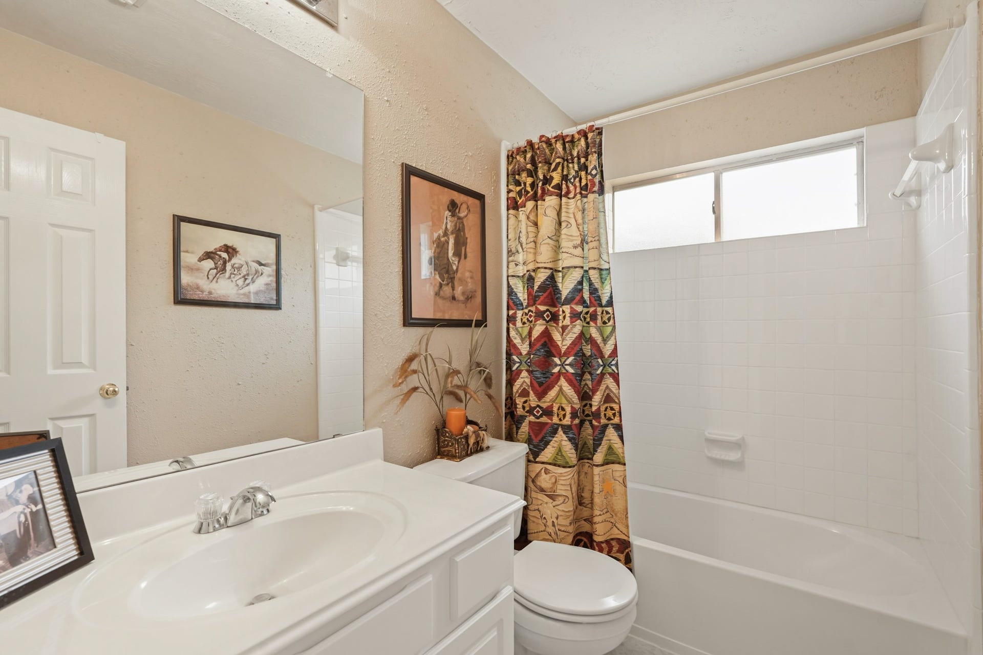 Secondary full tile surround Shower/Bath.