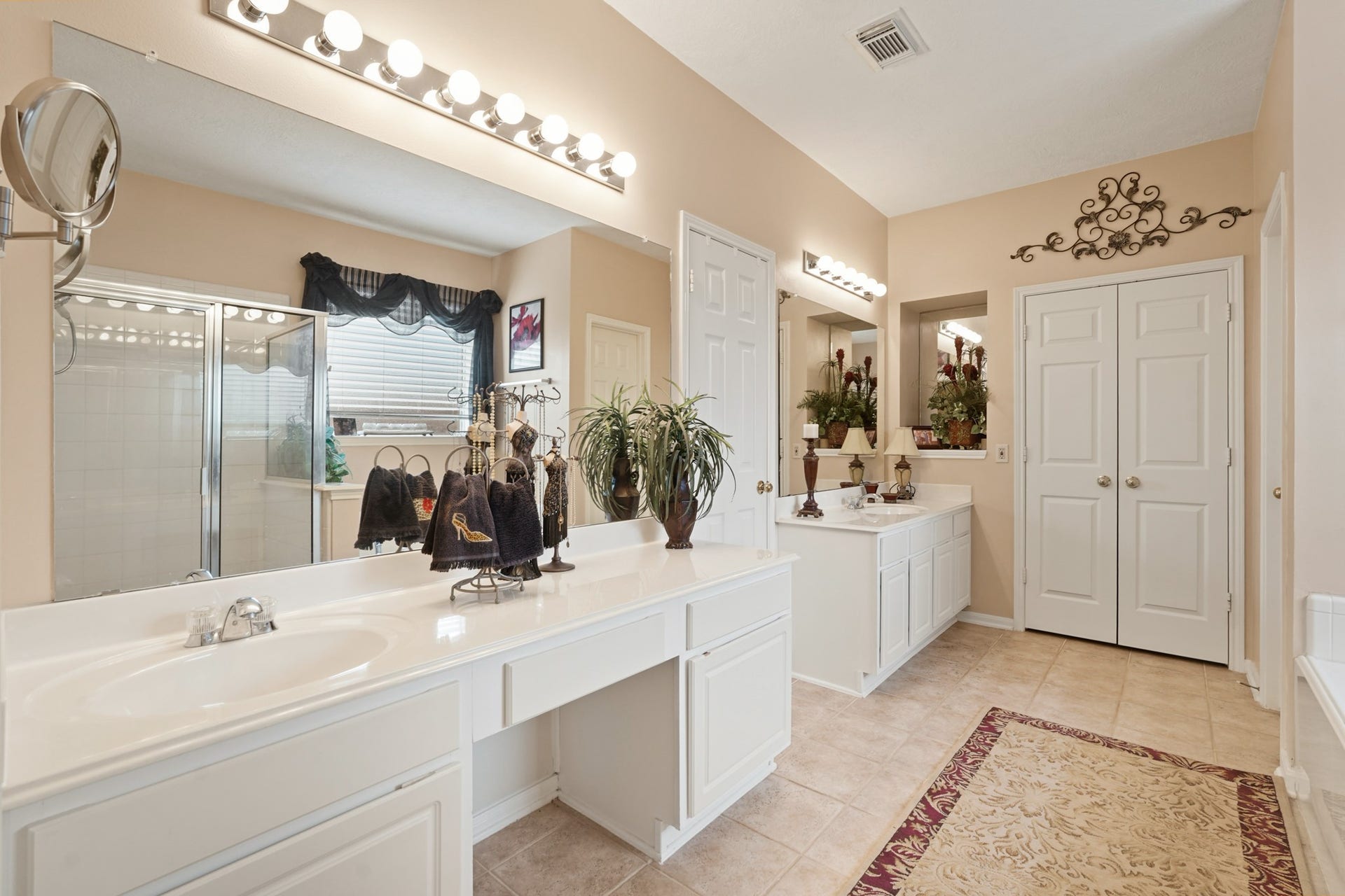 Another view of the bath and vanity area in the Primary Ensuite Bath.