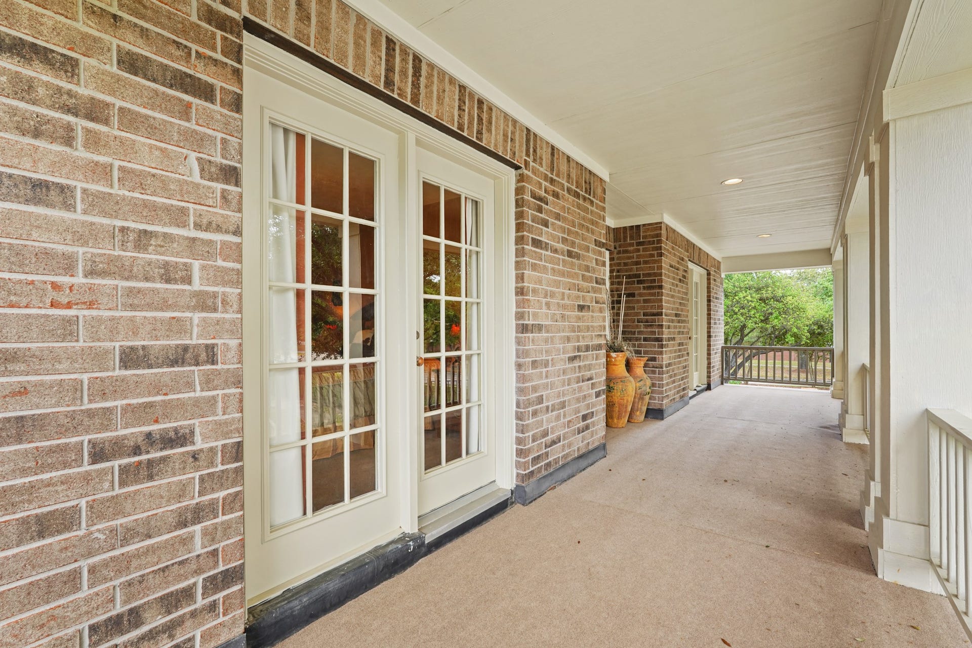 View of the Outdoor Balcony with access to two of the secondary bedrooms.