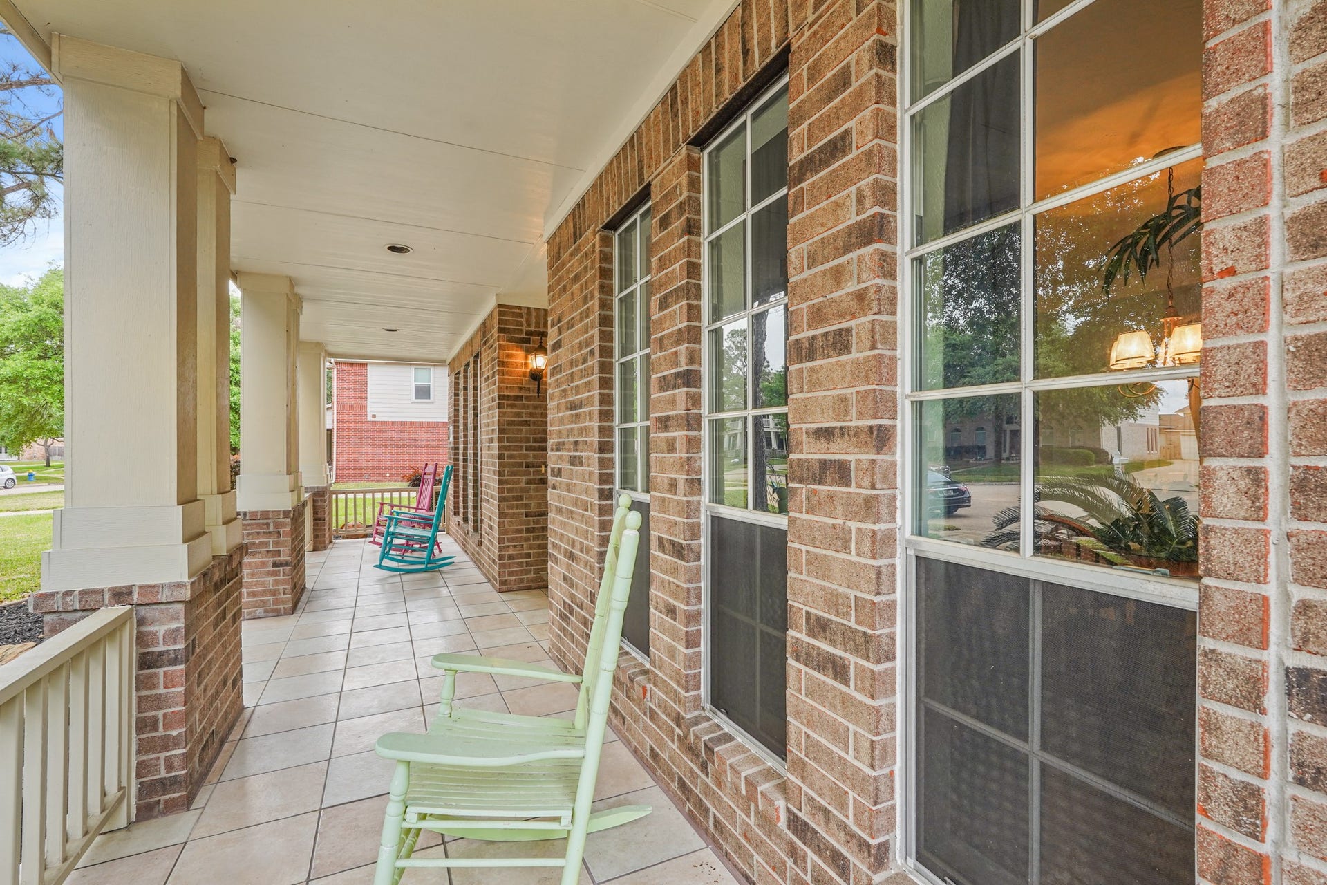 Comfortable spot on front porch for rest and relaxation.