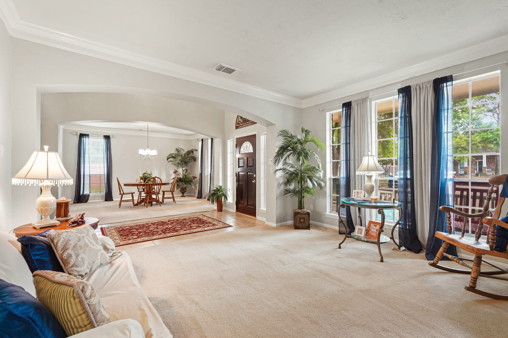 A view of the Front Entry, Formal Dining and Formal Living areas.