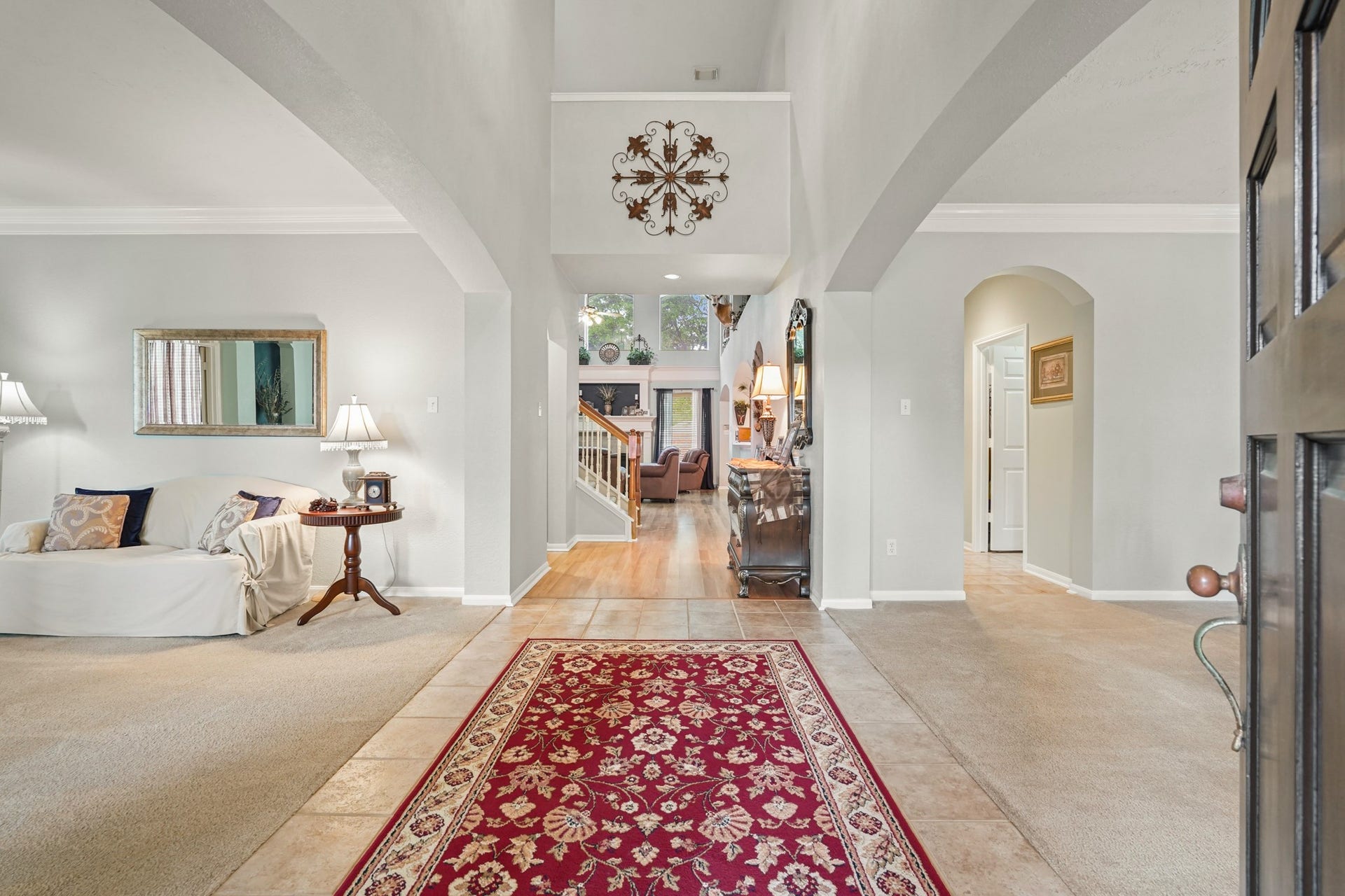 Welcoming high ceiling front entry. Great floorplan for entertaining.