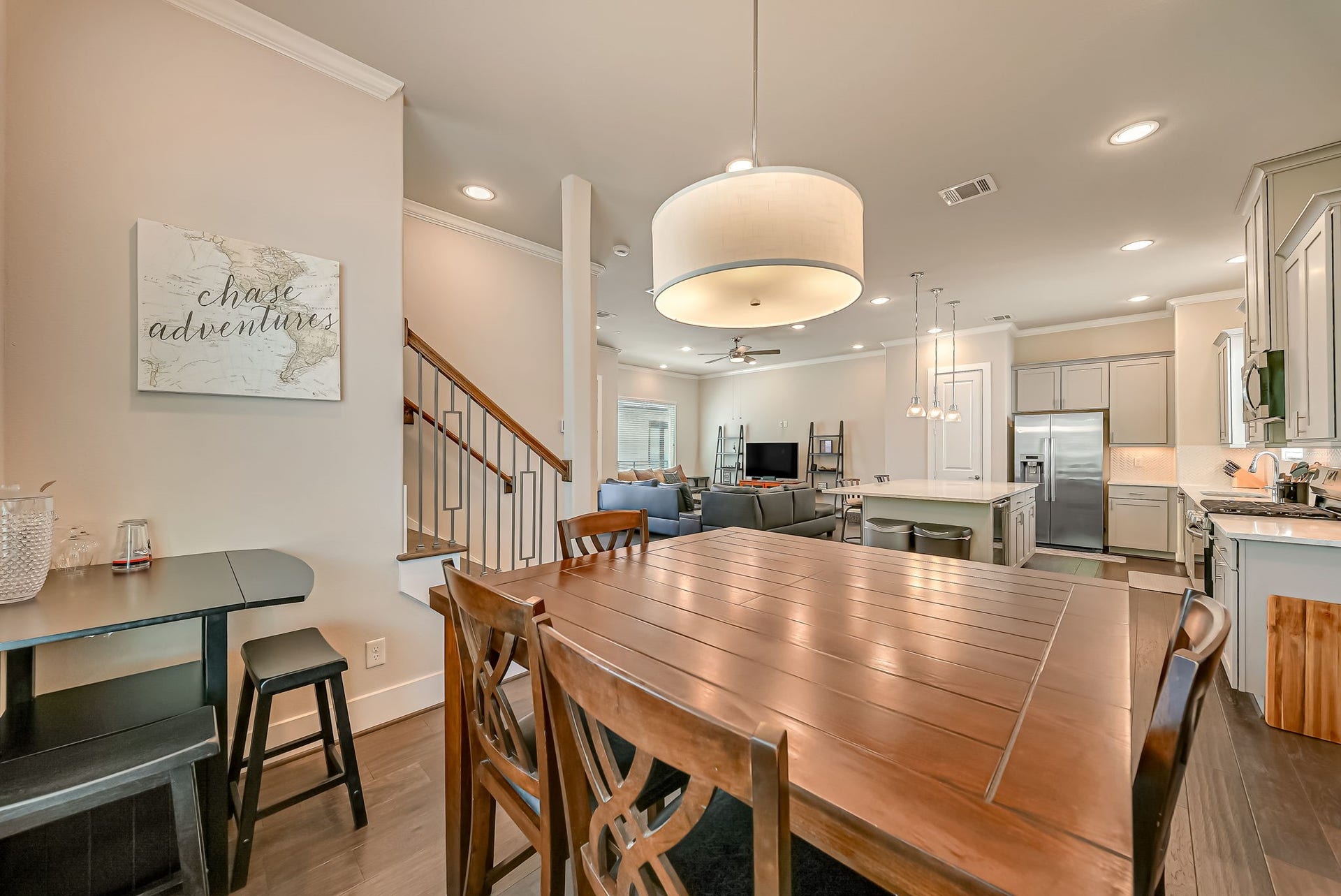 5916 Petty Street, #A, Houston, TX 77007 Expansive second-floor living area with seamless flow between the kitchen, dining, and gathering spaces.
