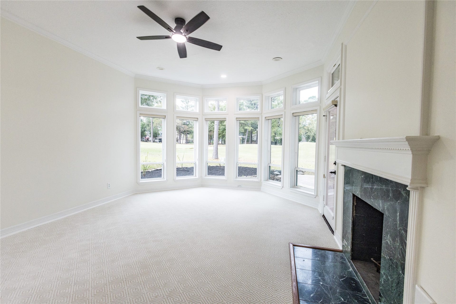 3230 Lake Island Drive, Montgomery, TX 77356 Primary bedroom with its own fireplace looking at the Golfcourse