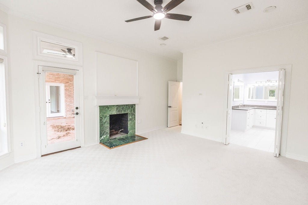 3230 Lake Island Drive, Montgomery, TX 77356 Primary bedroom has a door to step outside on the back porch to enjoy your morning coffee