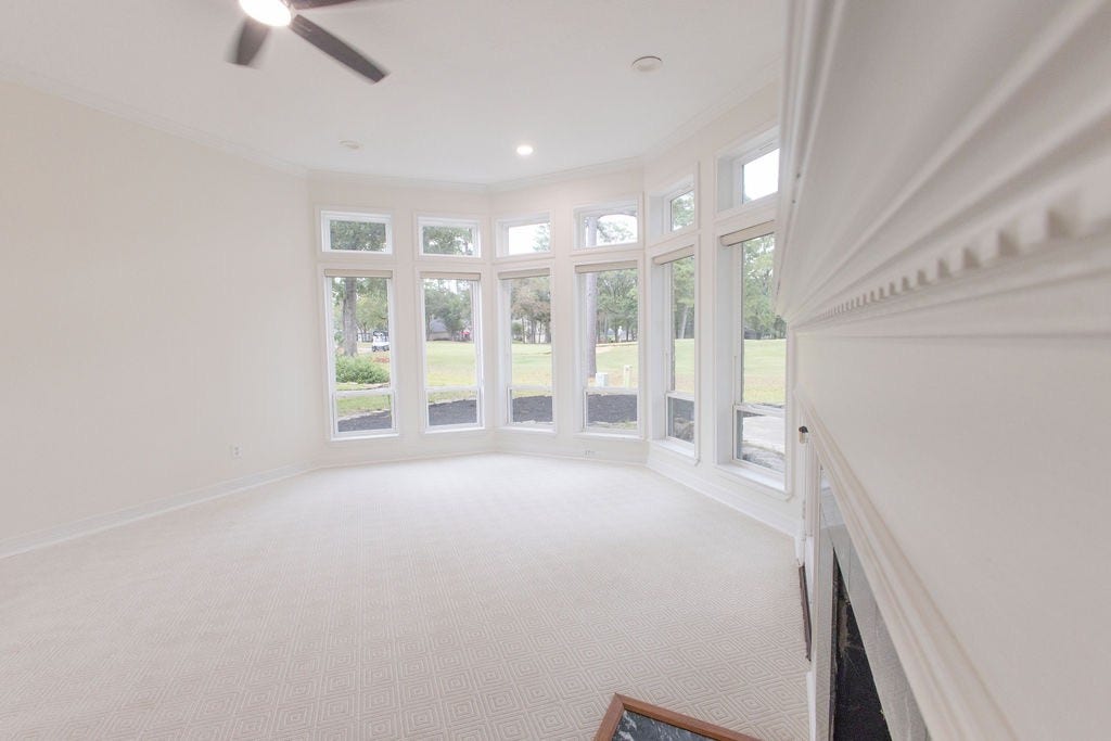 3230 Lake Island Drive, Montgomery, TX 77356 Primary bedroom boasts the luxurious carpet especially ordered for this project