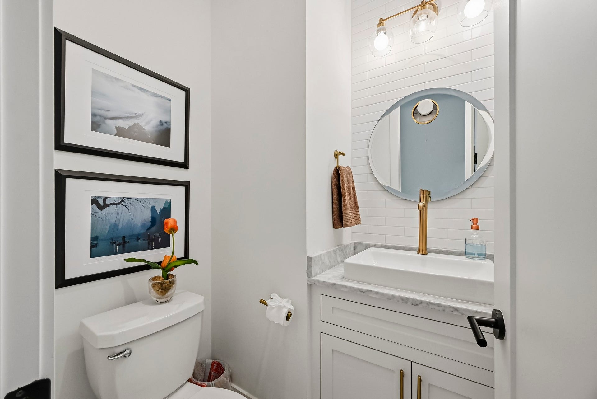 half bath conveniently located for guest use.