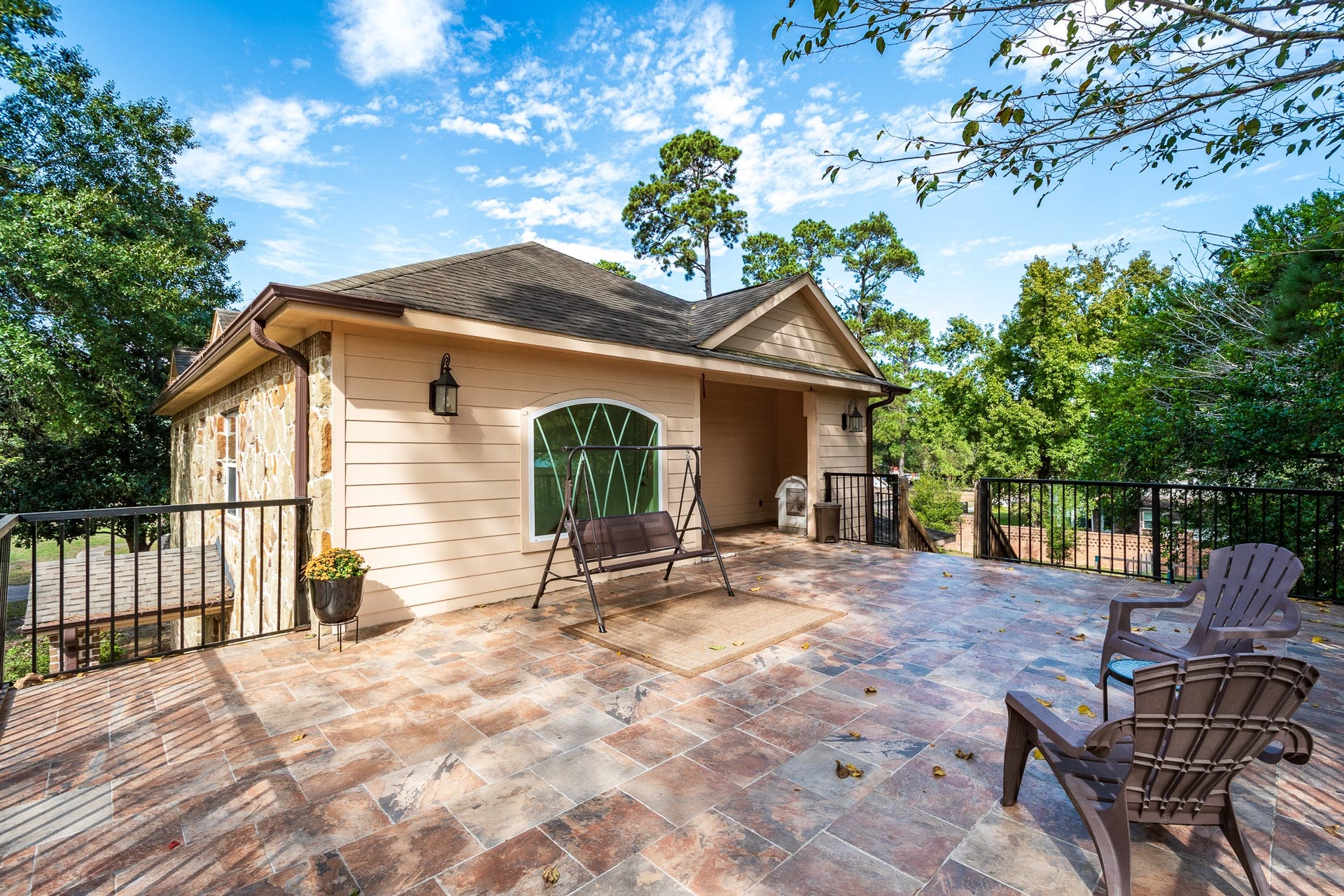 305 Hill Brook Lane, Conroe, TX 77385 Beautiful terrace with room to relax and access to the back yard.