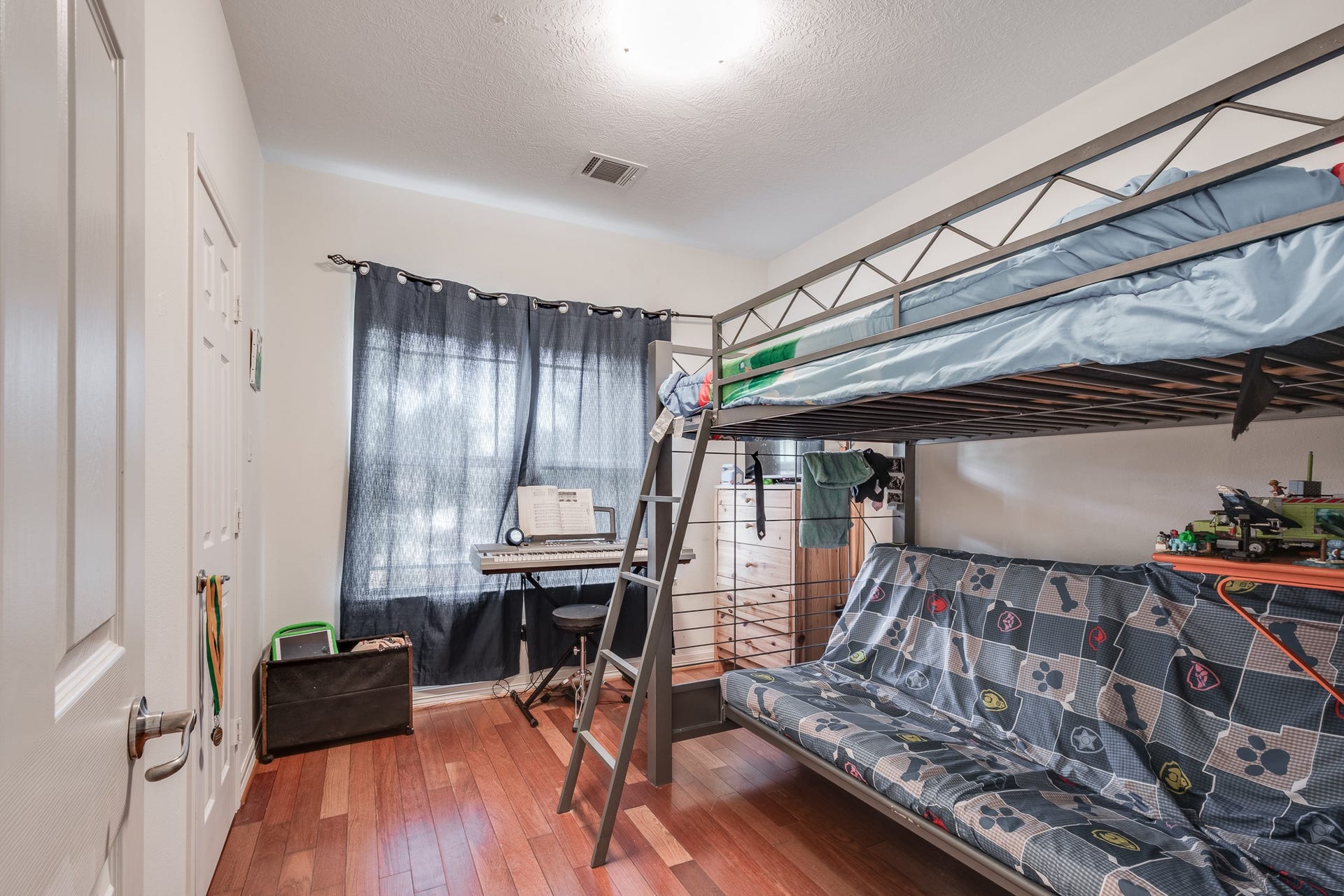 305 Hill Brook Lane, Conroe, TX 77385 First upstairs bedroom.