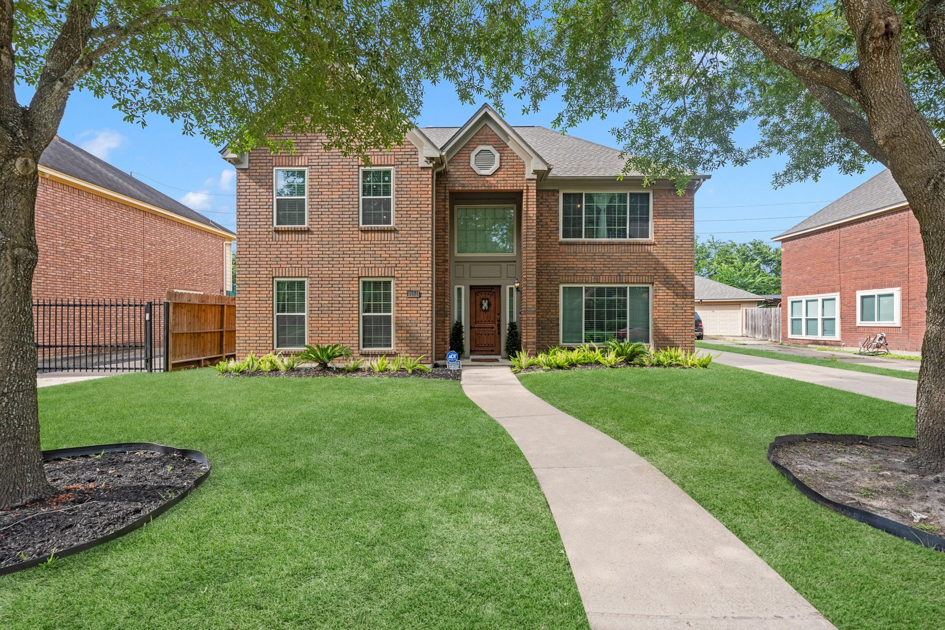 3514 Corbett Court, Missouri City, TX 77459 Large front yard with a long driveway to the detached garage.