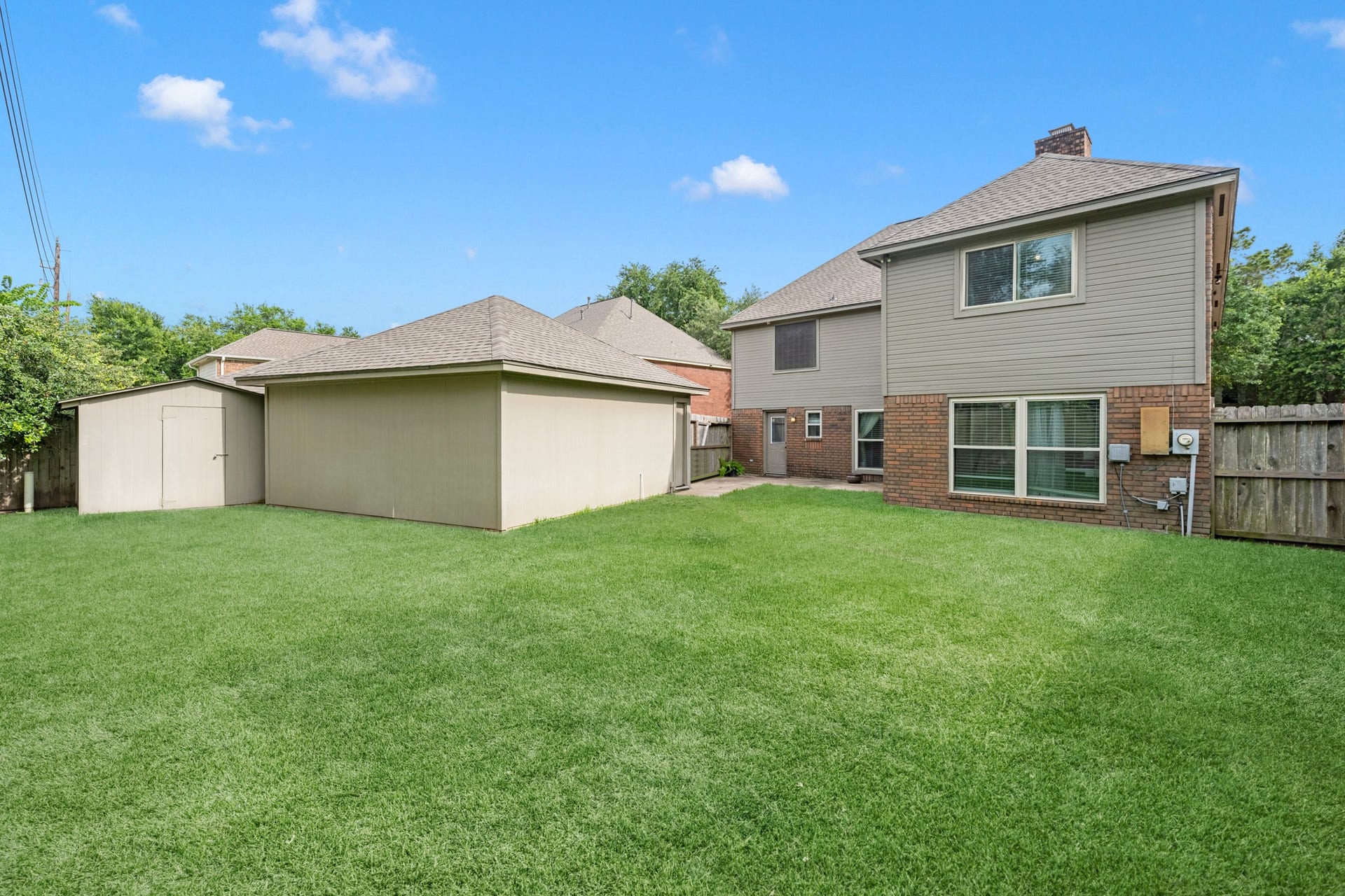 3514 Corbett Court, Missouri City, TX 77459 Large backyard with a dethatched garage is fully fenced, the patio offers the perfect space for grilling.