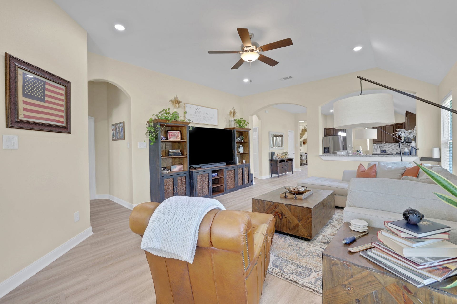 12751 County Road 283, Alvin, TX 77511 Family room with newly installed Luxury Vinyl Flooring that flows seamlessly from the front door all the way through the main living areas