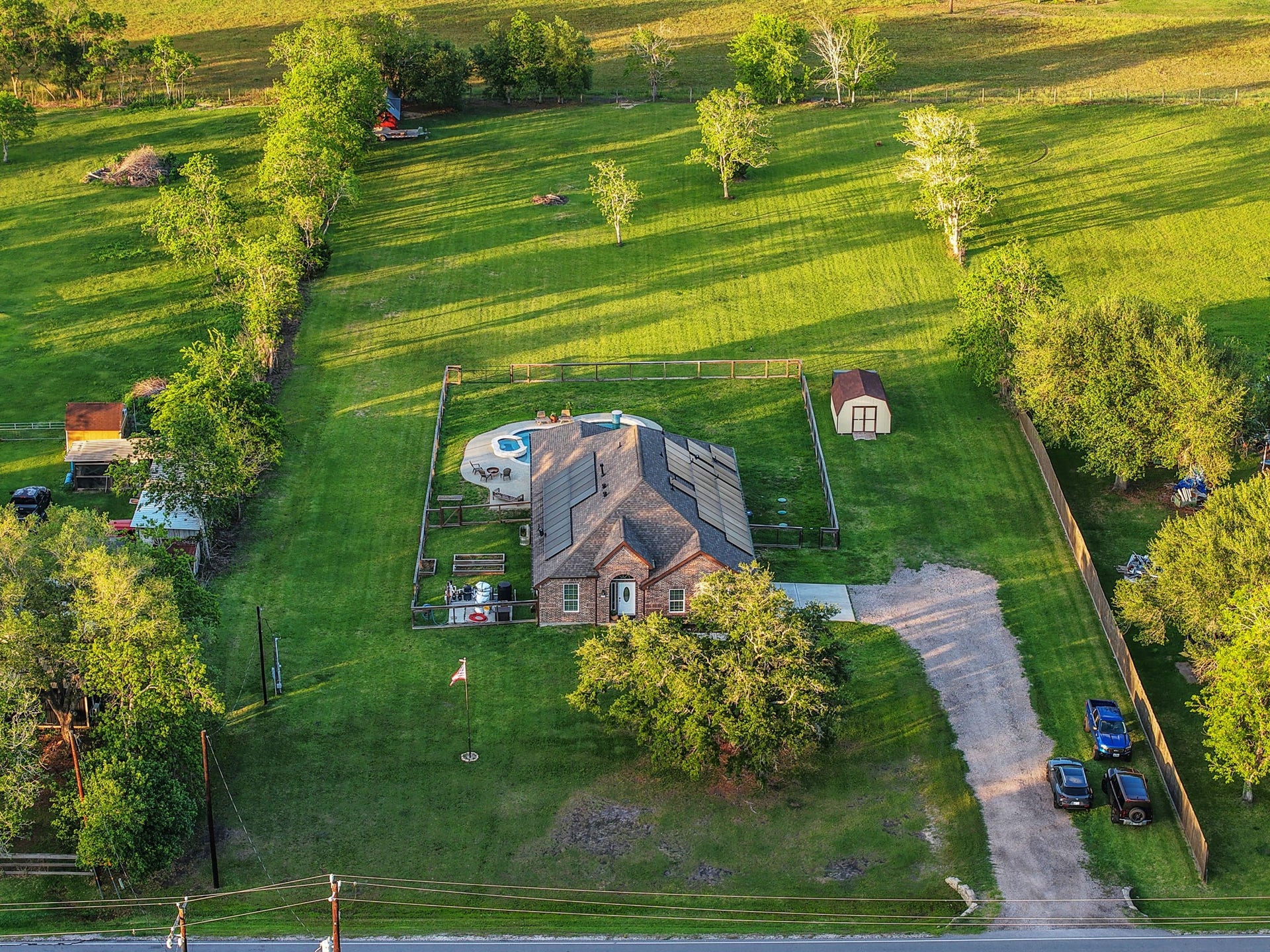 12751 County Road 283, Alvin, TX 77511 Charming home on a 2 acre lot, featuring a well-maintained yard, private pool, and ample parking. Ideal for those seeking tranquility and outdoor enjoyment.
