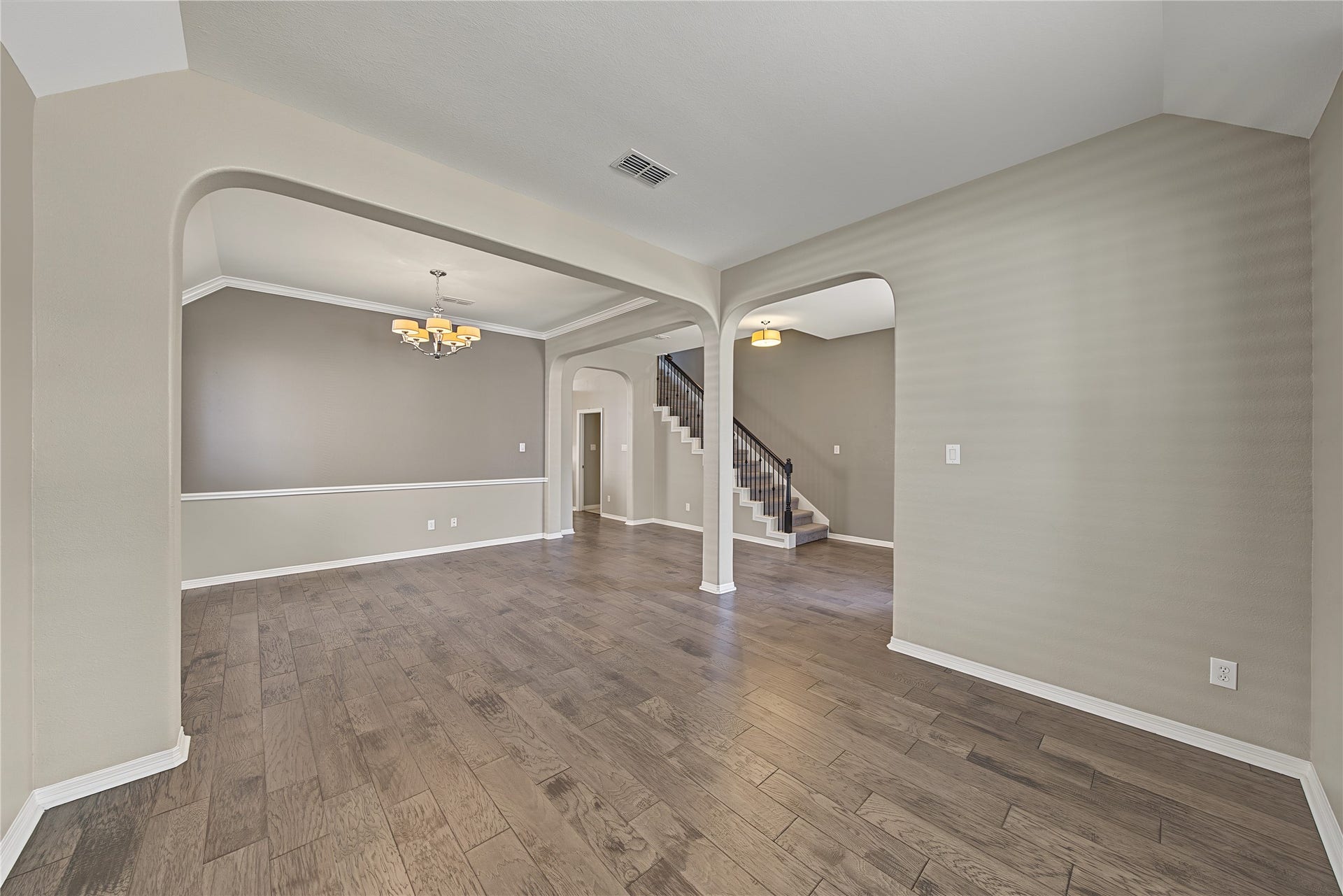 6723 Sotoria Lane, Sugar Land, TX 77479 View from formal living: you can see formal dinning with warm chandelier