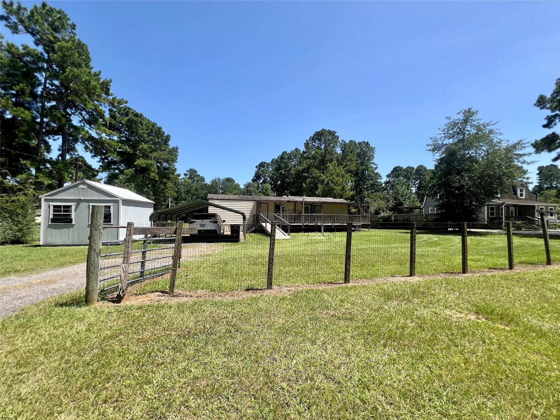 Fenced across the front of property