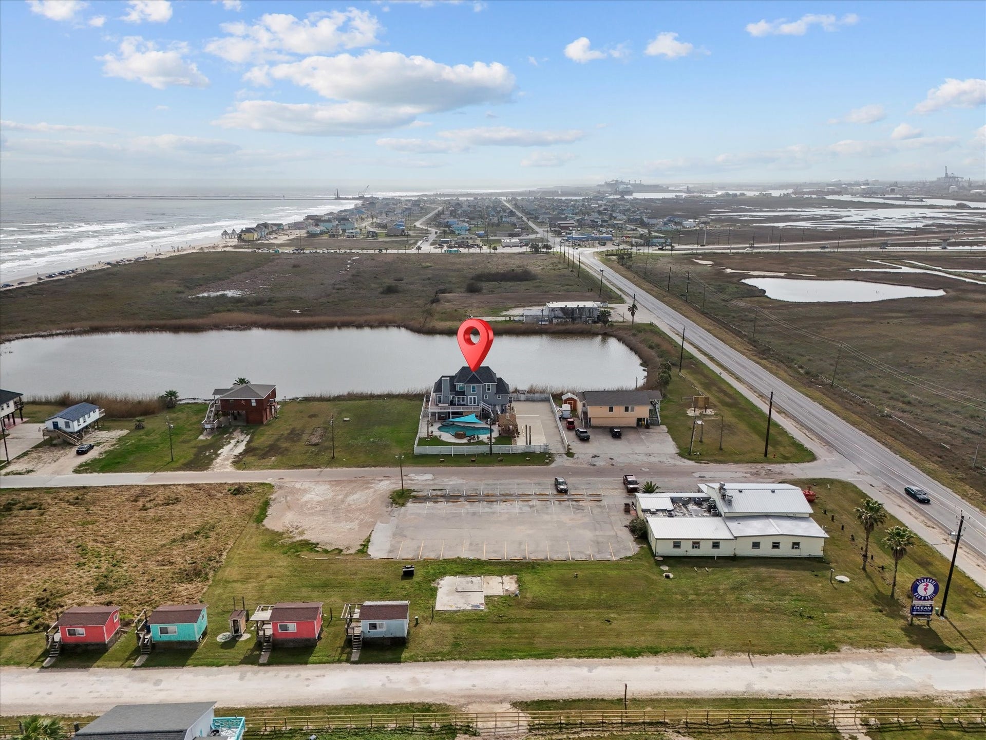 319 Francis Cove, Surfside Beach, TX 77541 This coastal property offers stunning views with proximity to the ocean and a serene crabbing pond. It features easy access to main roads and nearby amenities, providing a perfect blend of tranquility and convenience.