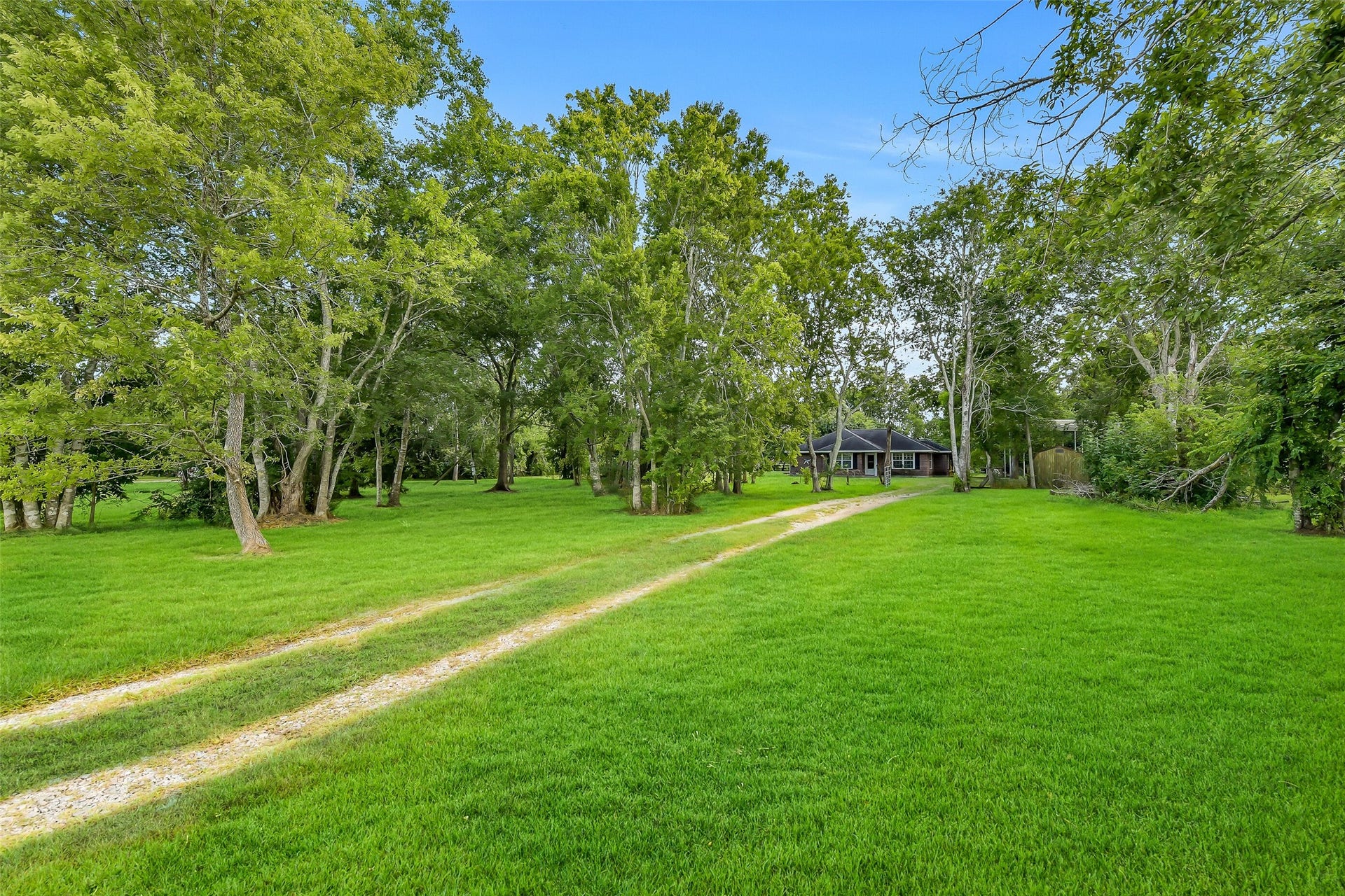 16523 County Road 191, Alvin, TX 77511 Welcome Home! This acreage property hosts a Tilson custom home with room to grow.