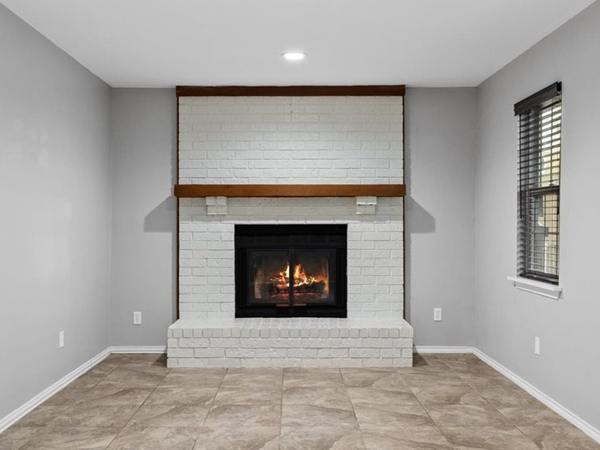 16963 Chapel Pines Drive, #57, Spring, TX 77379 Beautiful painted brick fireplace