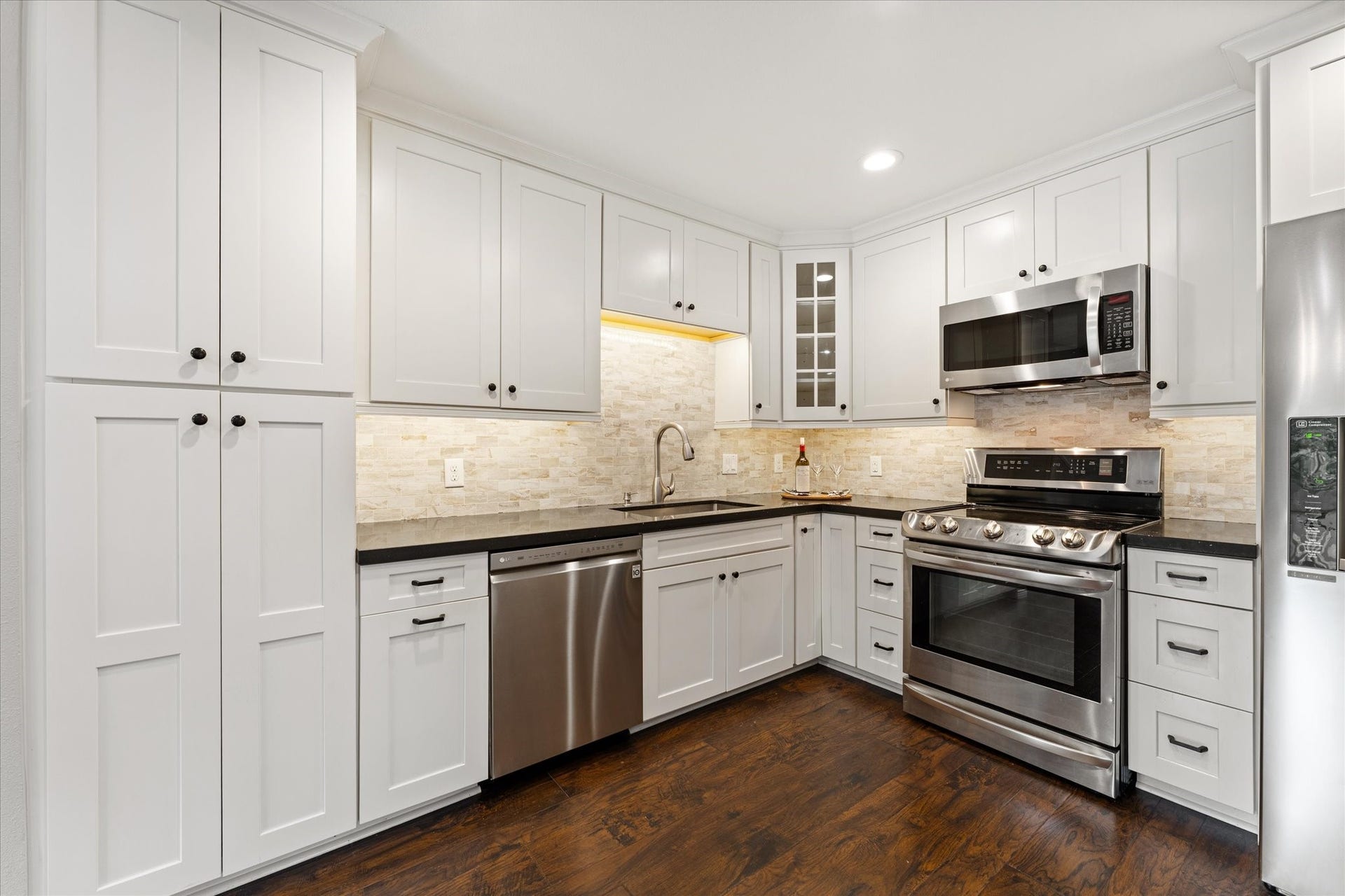 16963 Chapel Pines Drive, #57, Spring, TX 77379 Upgrades include the tall pantry-style cabinets for extra storage space