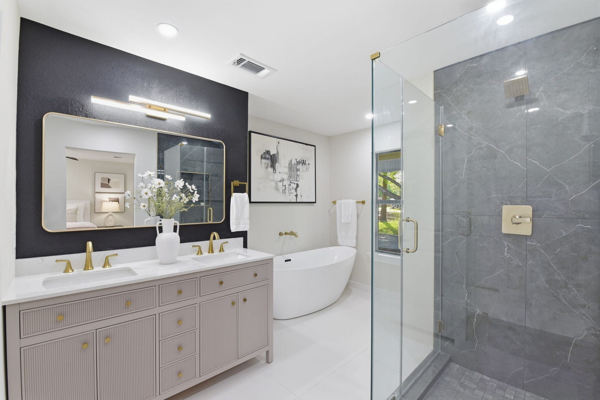1011 Sycamore Road, Richmond, TX 77469 Primary bathroom with free standing tub and 2 side frameless shower