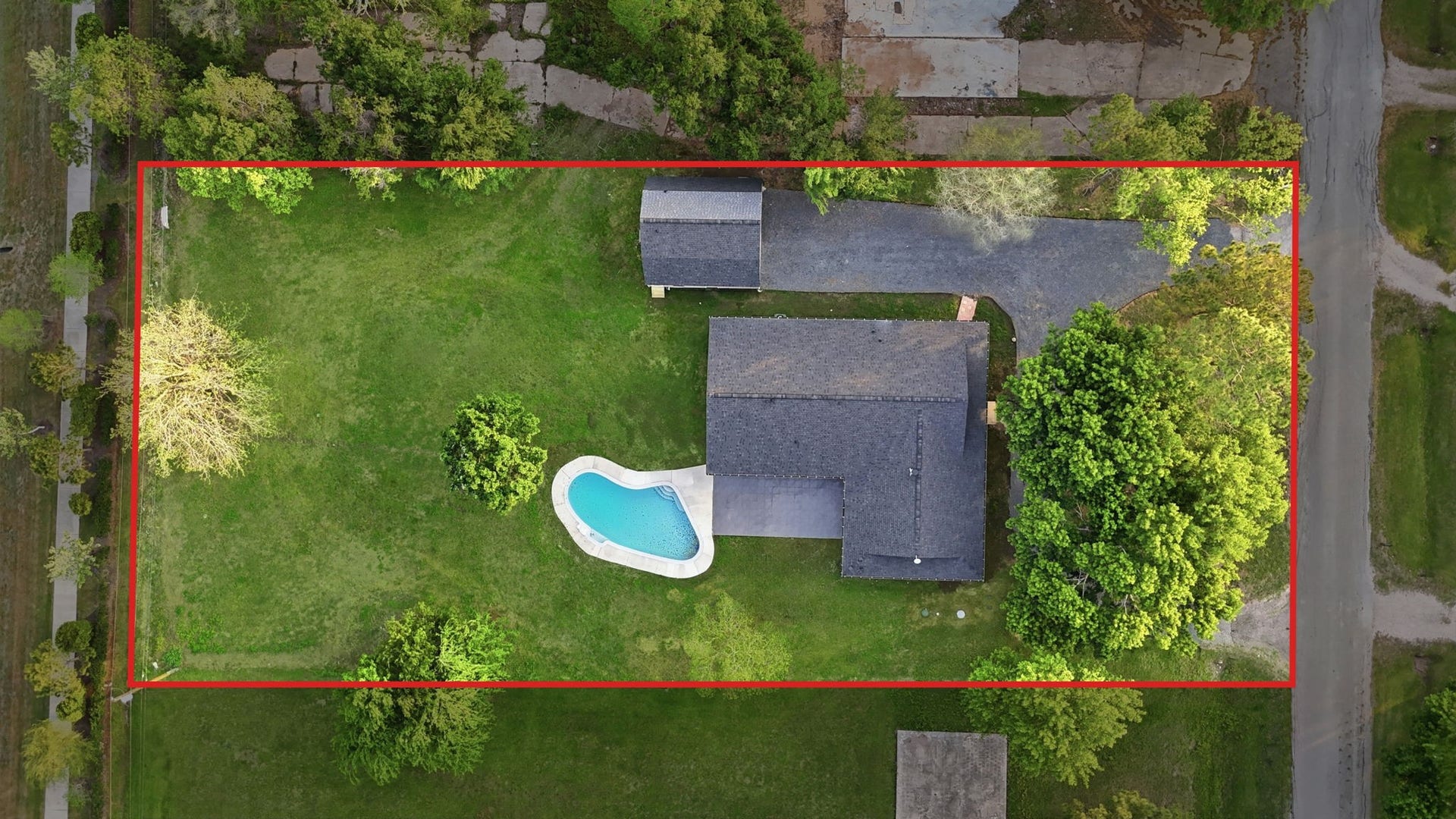 1011 Sycamore Road, Richmond, TX 77469 Drone view for the house with a pool