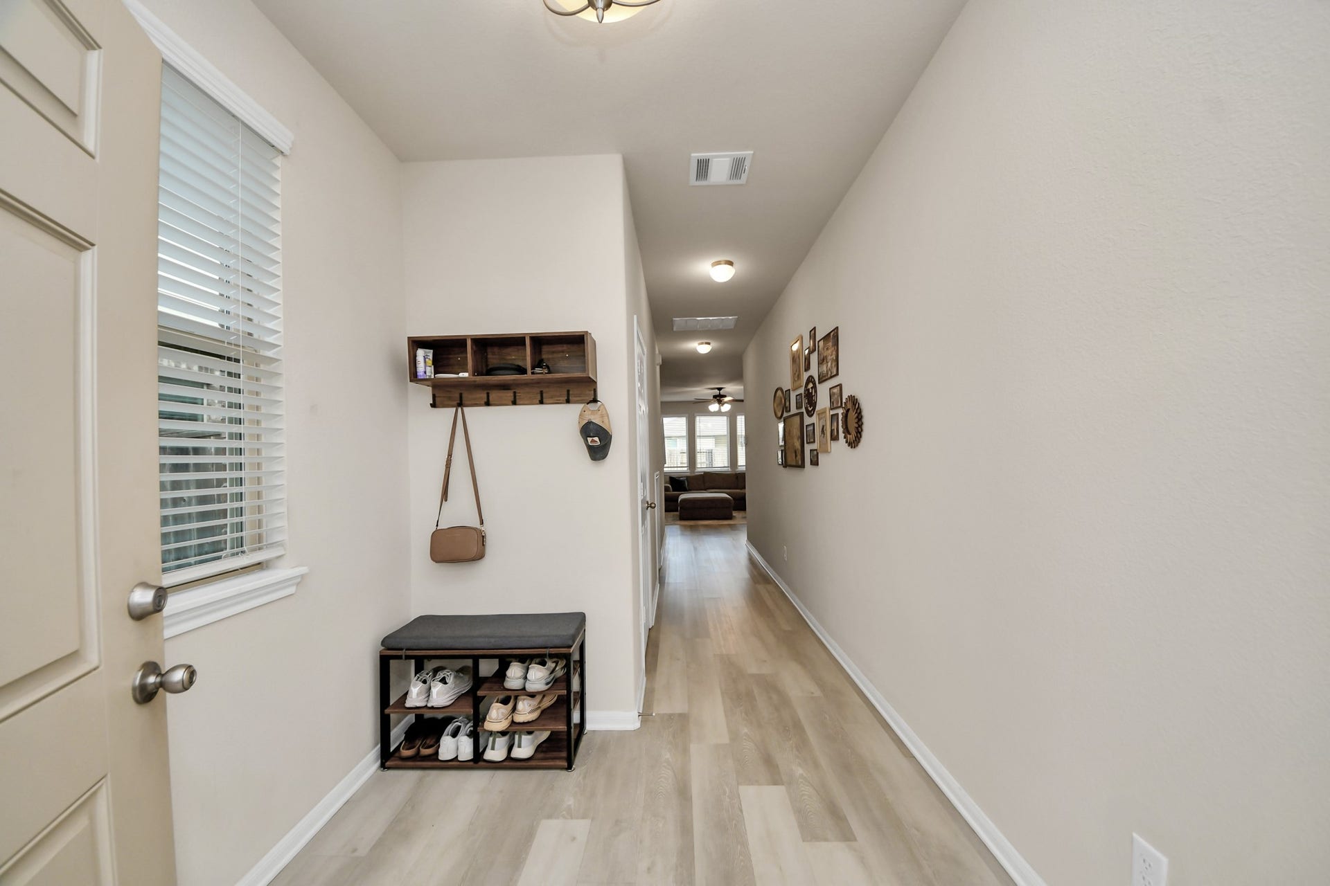 26030 Drover Sky Court, Richmond, TX 77406 Welcoming entry with space for bag or shoe storage.