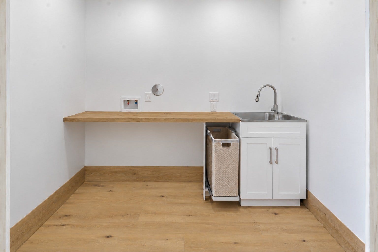 12 N Timber Top Dr, Spring, TX 77380 Dedicated laundry room w/ utility sink, ample folding counter space.