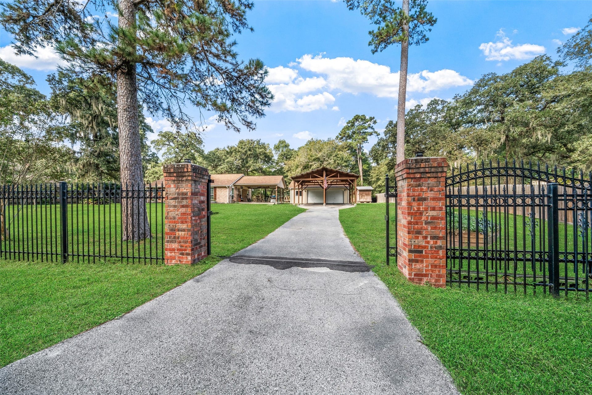 The gate is always open welcoming you in the moment you arrive at this awesome property. We invite you to grab your favorite realtor and come see it in person so you can experience firsthand how peaceful and truly tranquil this little slice of country living is at 32606 Dogwood Trl. The entire property is fully fenced on all sides, offering both privacy and comfort. We hope to see you soon!