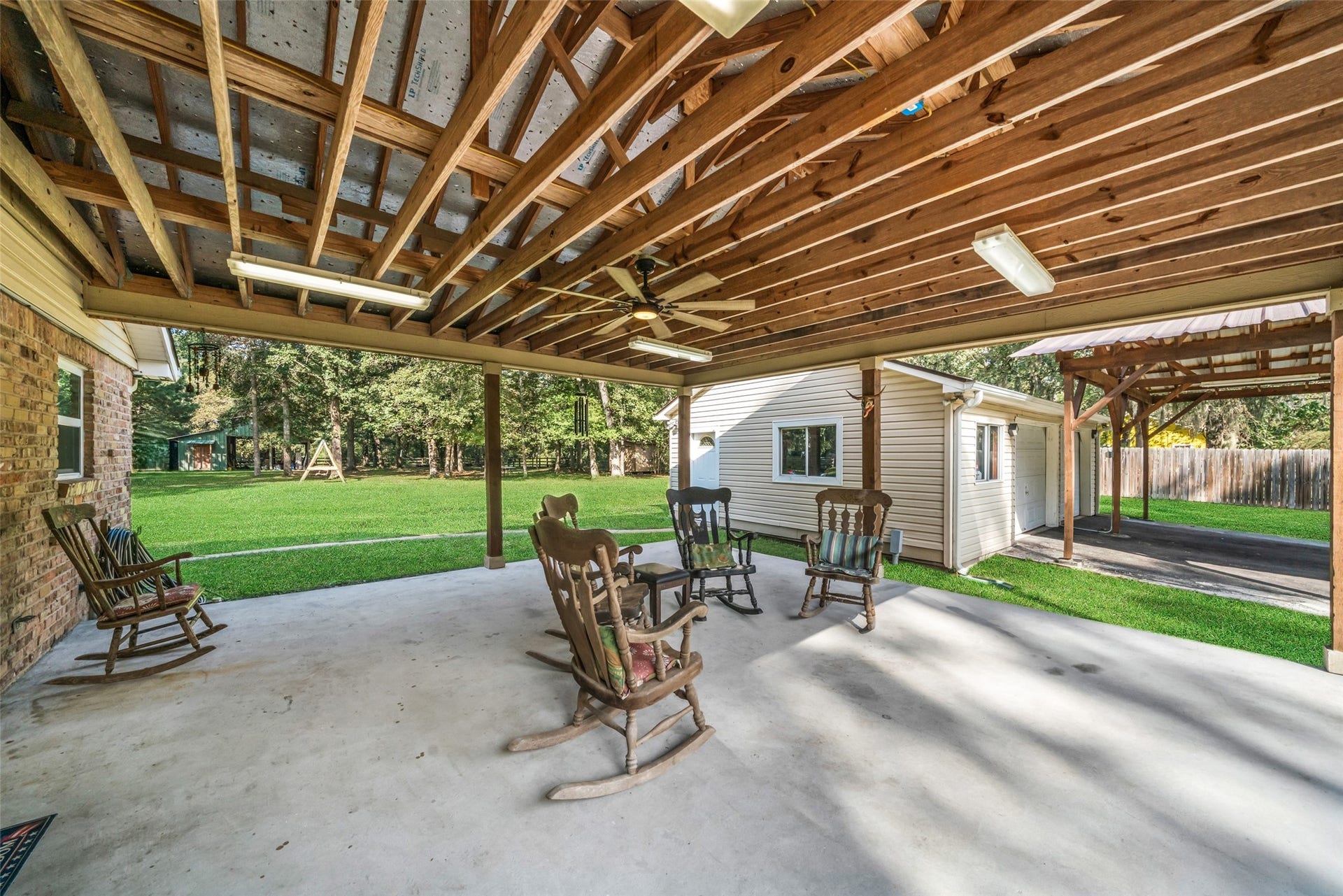 Easy access to the detached garage and carport, everything you need is in close proximity. You will enjoy fantastic views of the backyard and beautiful barn in the distance.