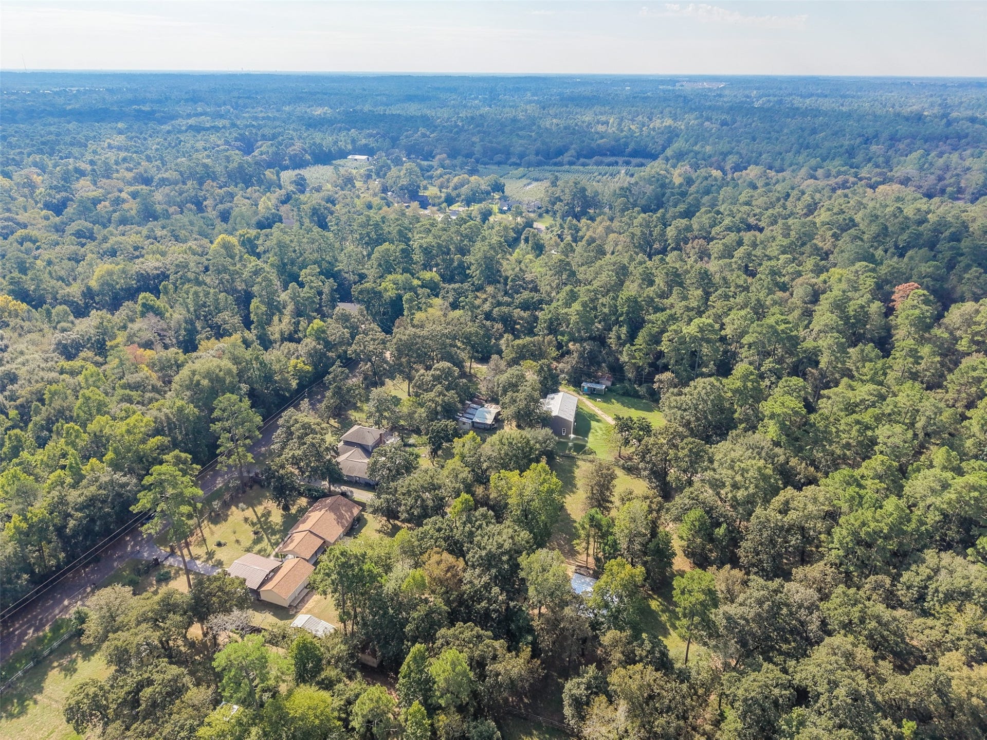 Such a gorgeous view, tucked in to this beautiful landscape of trees. You will feel like you have escaped the hustle and bustle of the everyday grind, you can't tell by this view, but you are within minutes of the everyday conveniences which makes this property location perfect.